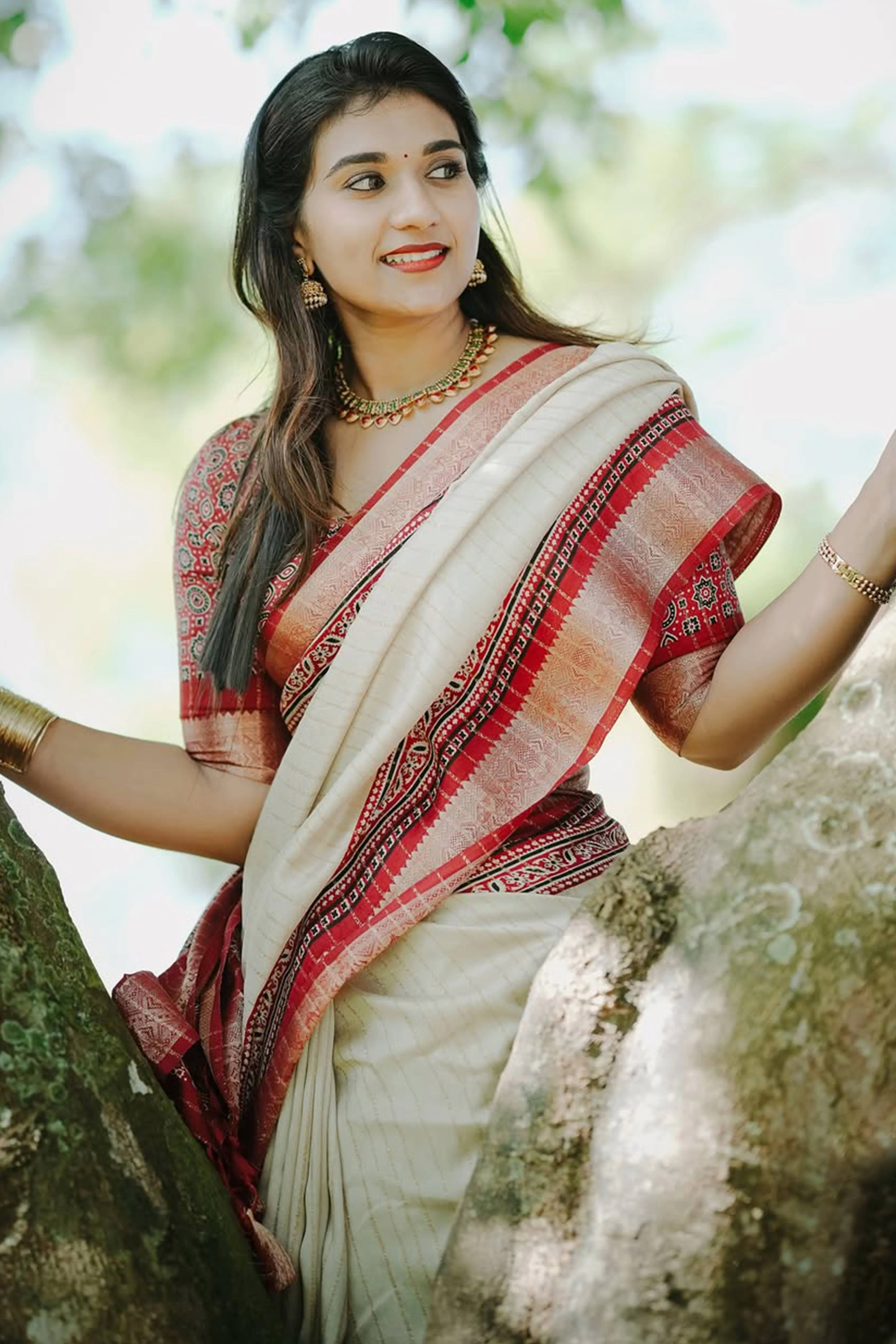 Graceful Light Chikoo Dola Silk Saree Featuring Striped Weave & Floral Border - Image 6