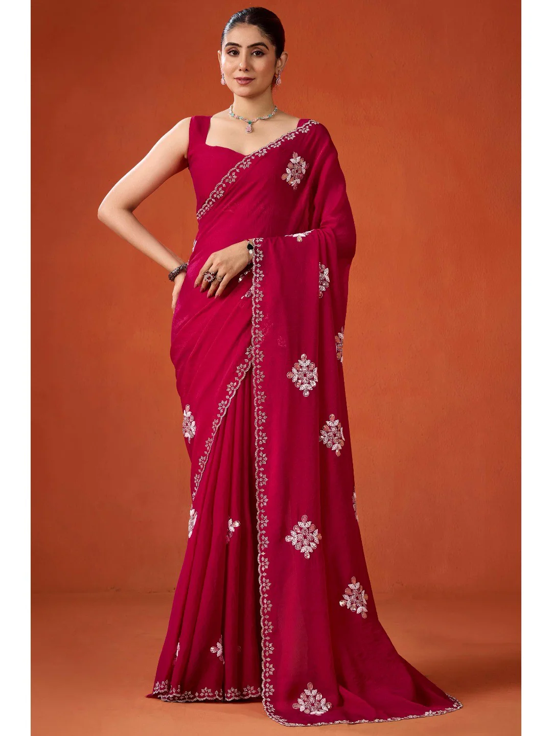 Graceful Magenta Georgette Silk Saree Adorned with Floral Embellishments
