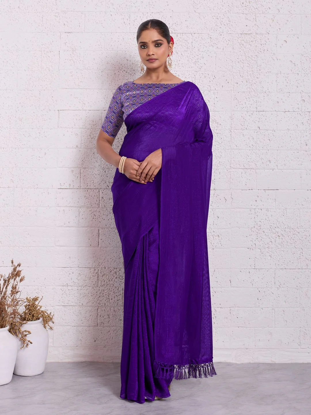 Graceful Purple Solid Pure Crunchy Saree Accented With Fine Tassel Pallu