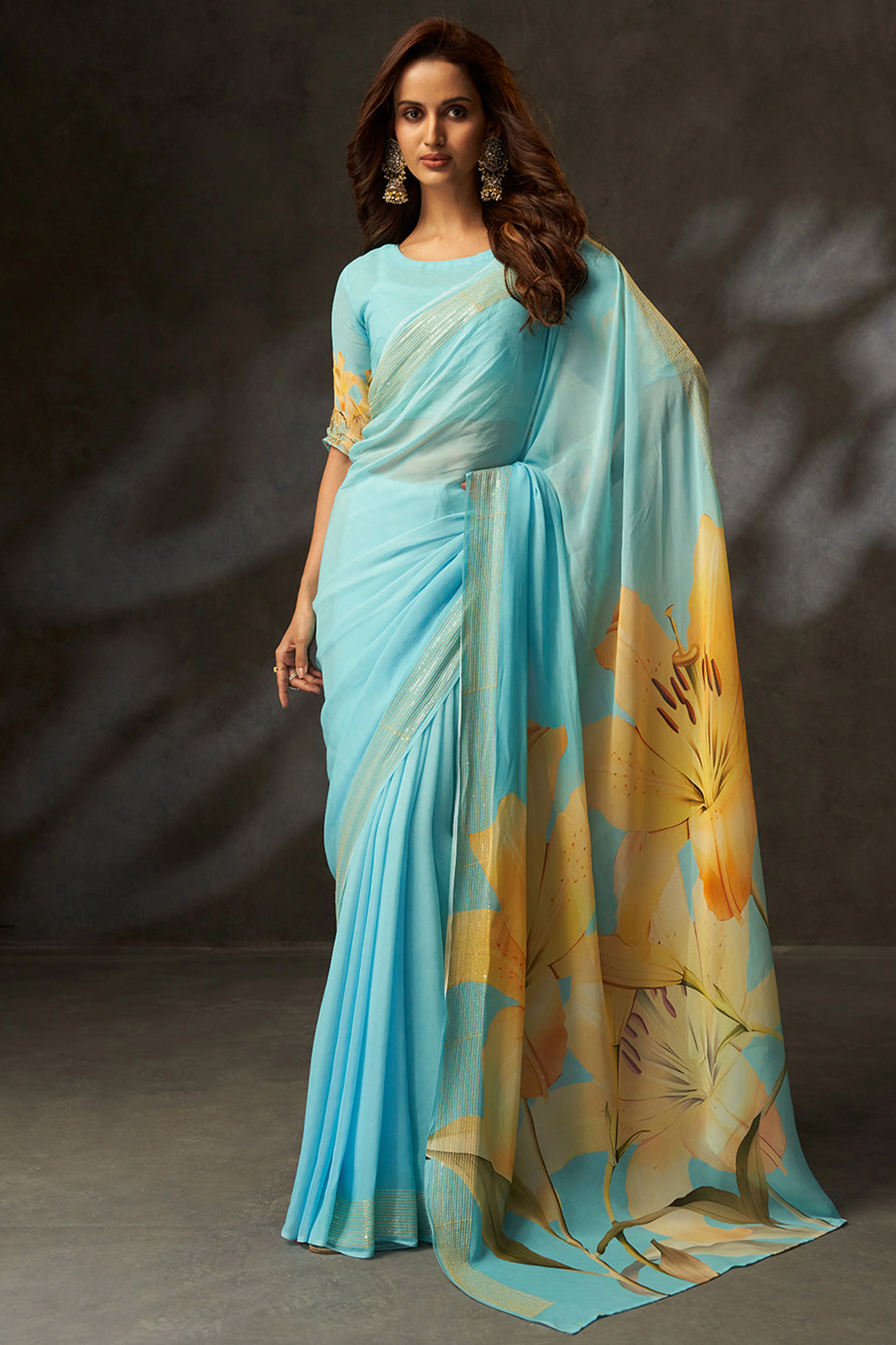 Graceful Sky Blue Floral Digital Print Saree in Georgette With Artistic Crochet Border Work
