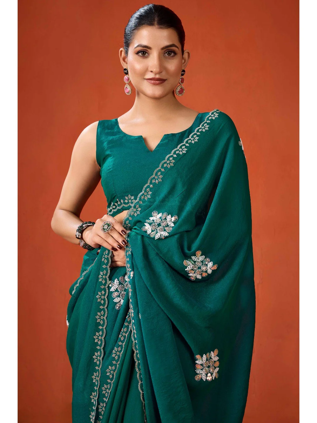 Graceful Teal Green Georgette Silk Saree Adorned with Floral Embellishments - Image 6