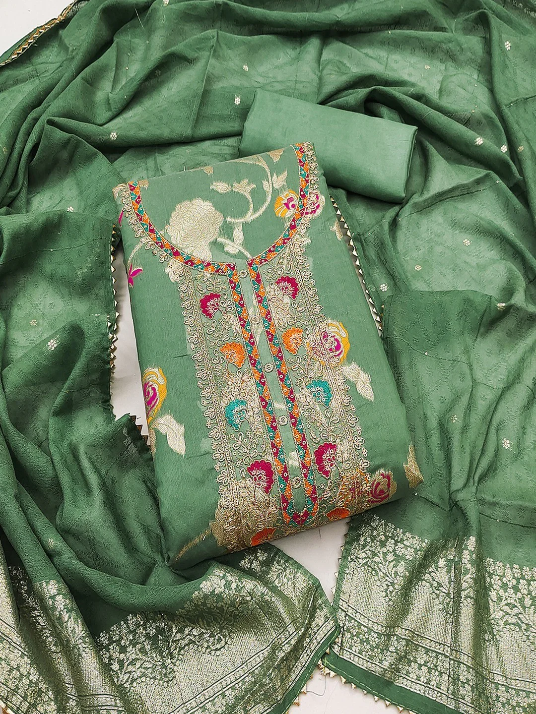 Green Elegant Modal Jacquard Dress Material Adorned with Intricate Zari Weaving