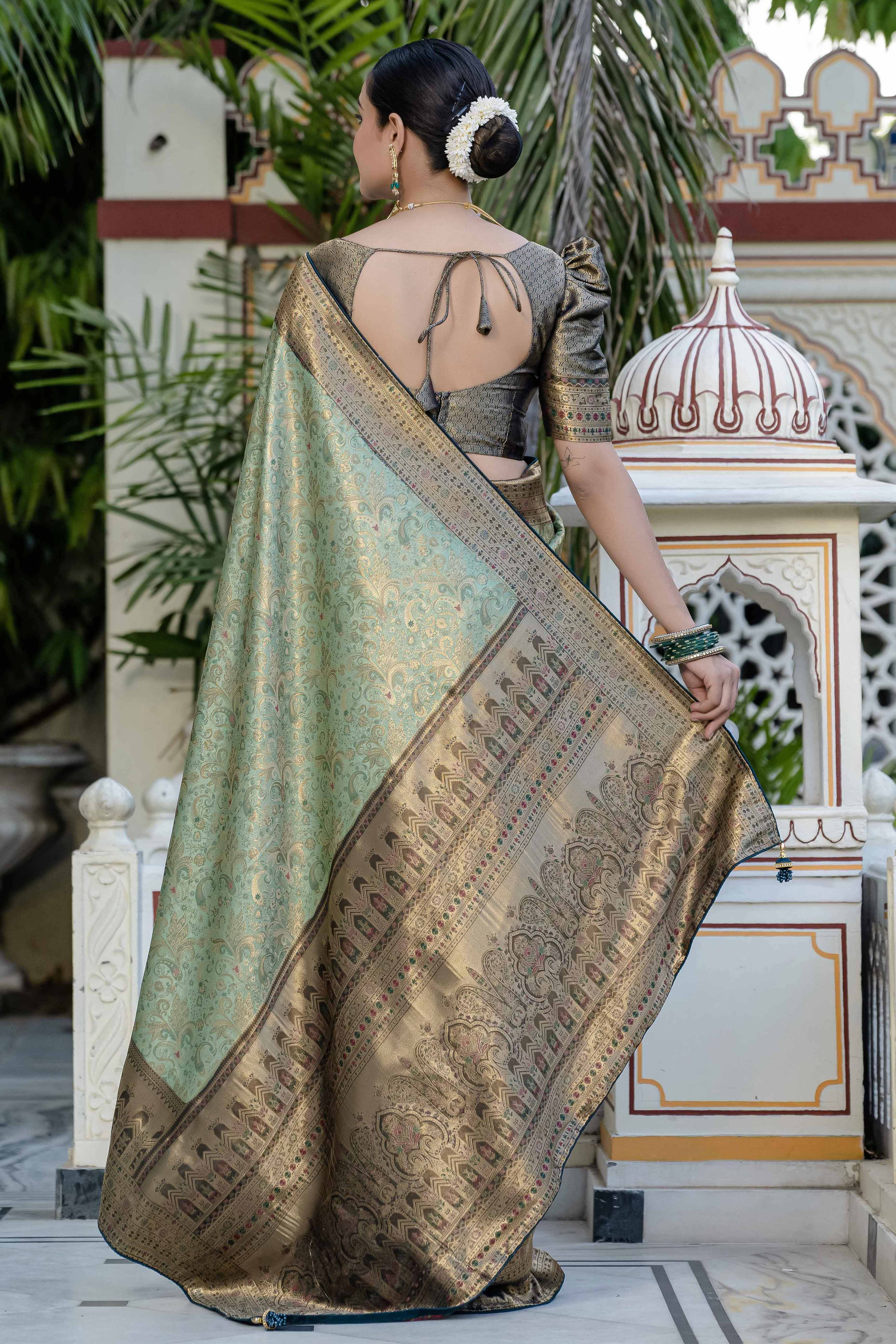 Green Kanjivaram Silk Saree Showcasing Floral Meenakari Zari Weaving With Elegant Piping & Tassels - Image 4