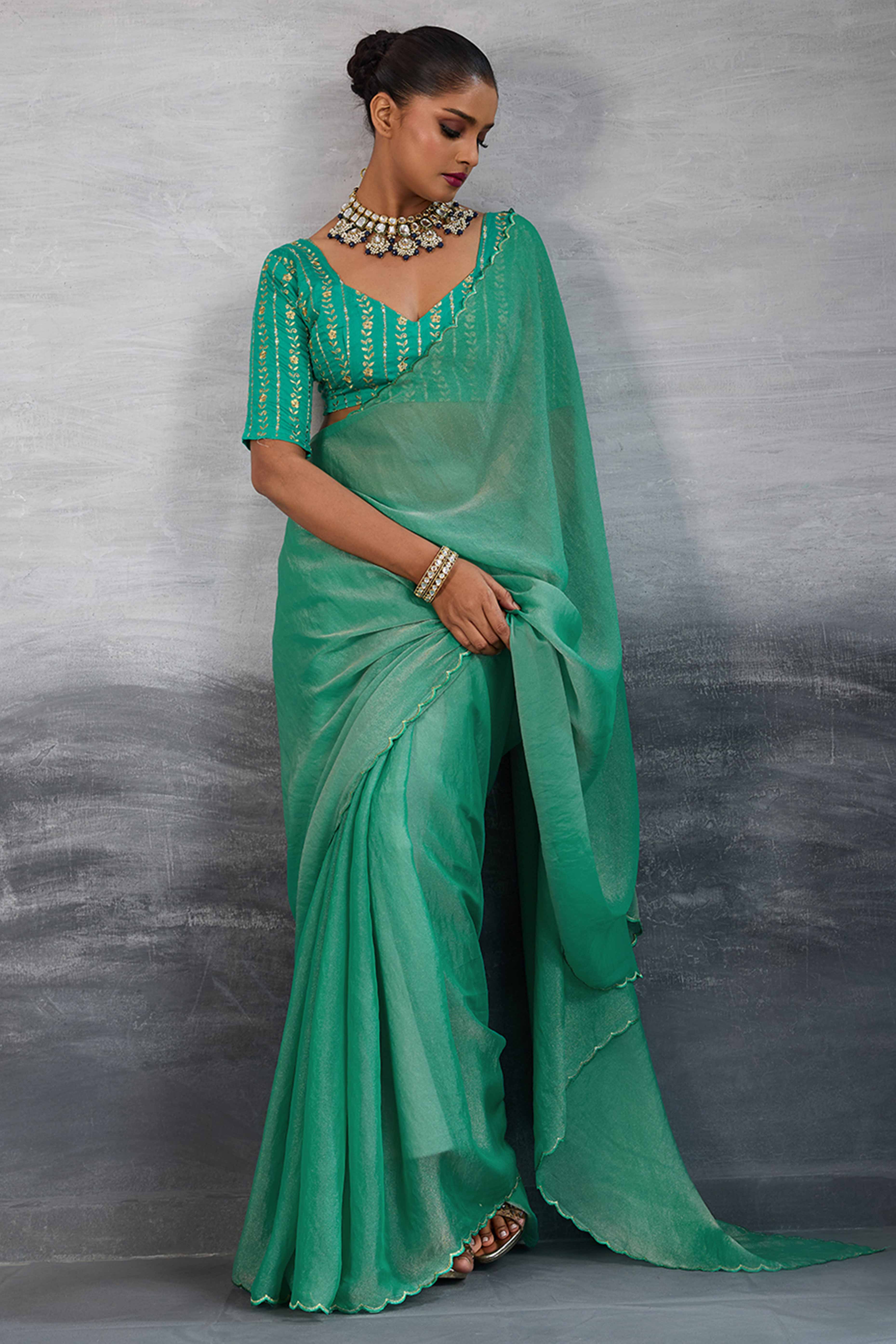Green Solid Organza Jimmy Choo Saree Accentuated With Elegant Cutwork Border Detailing - Image 3