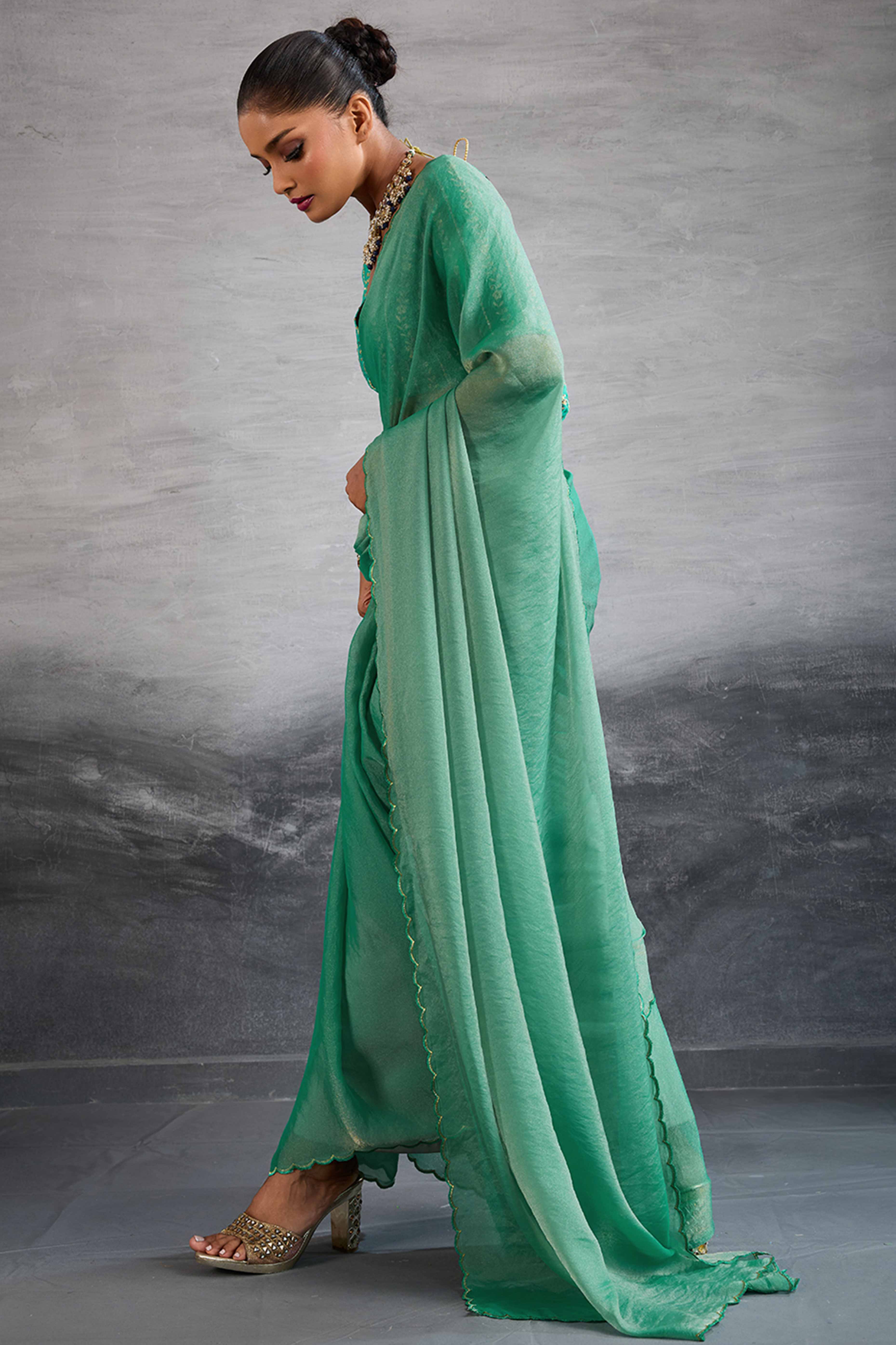 Green Solid Organza Jimmy Choo Saree Accentuated With Elegant Cutwork Border Detailing - Image 4