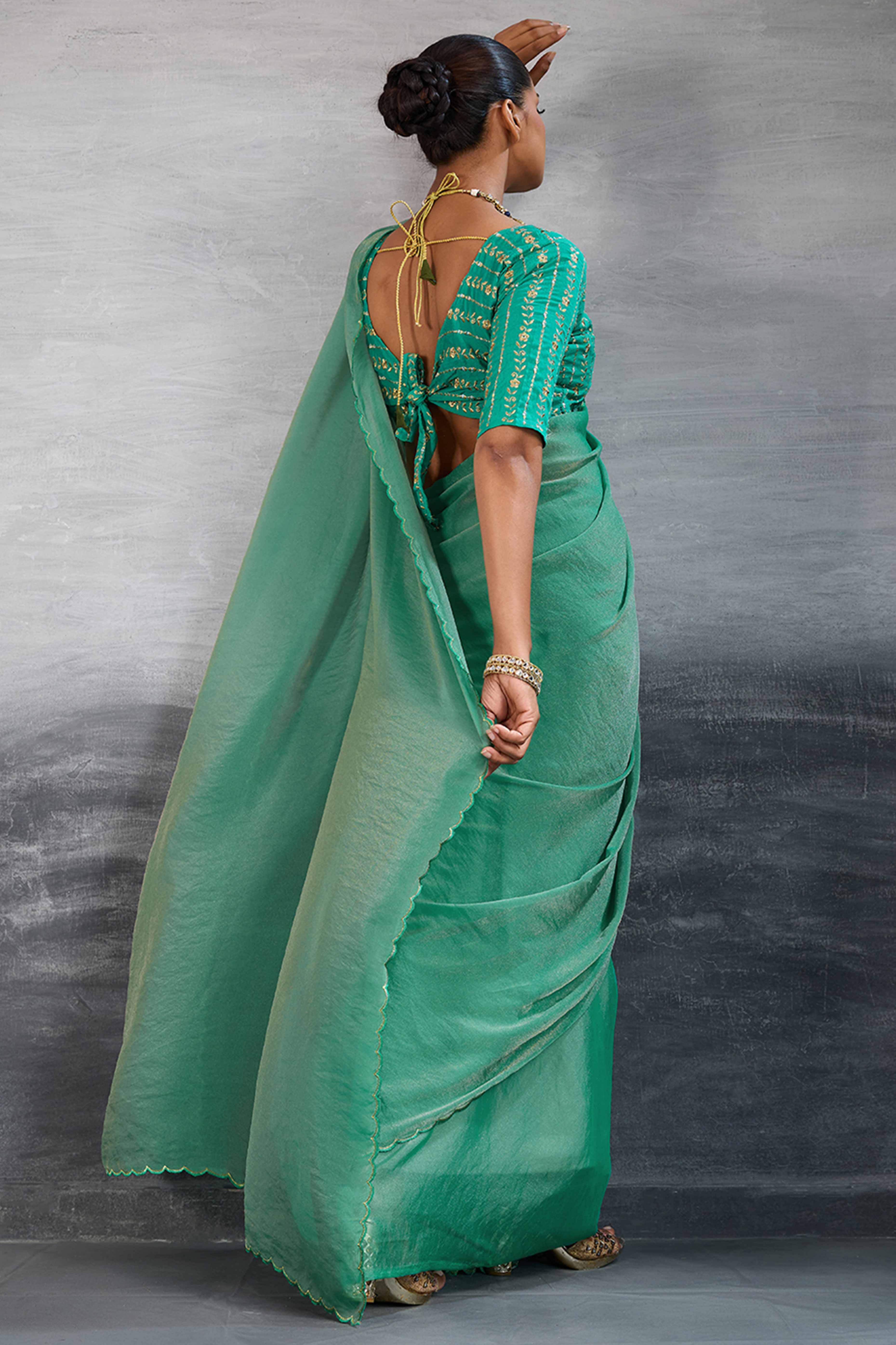 Green Solid Organza Jimmy Choo Saree Accentuated With Elegant Cutwork Border Detailing - Image 5
