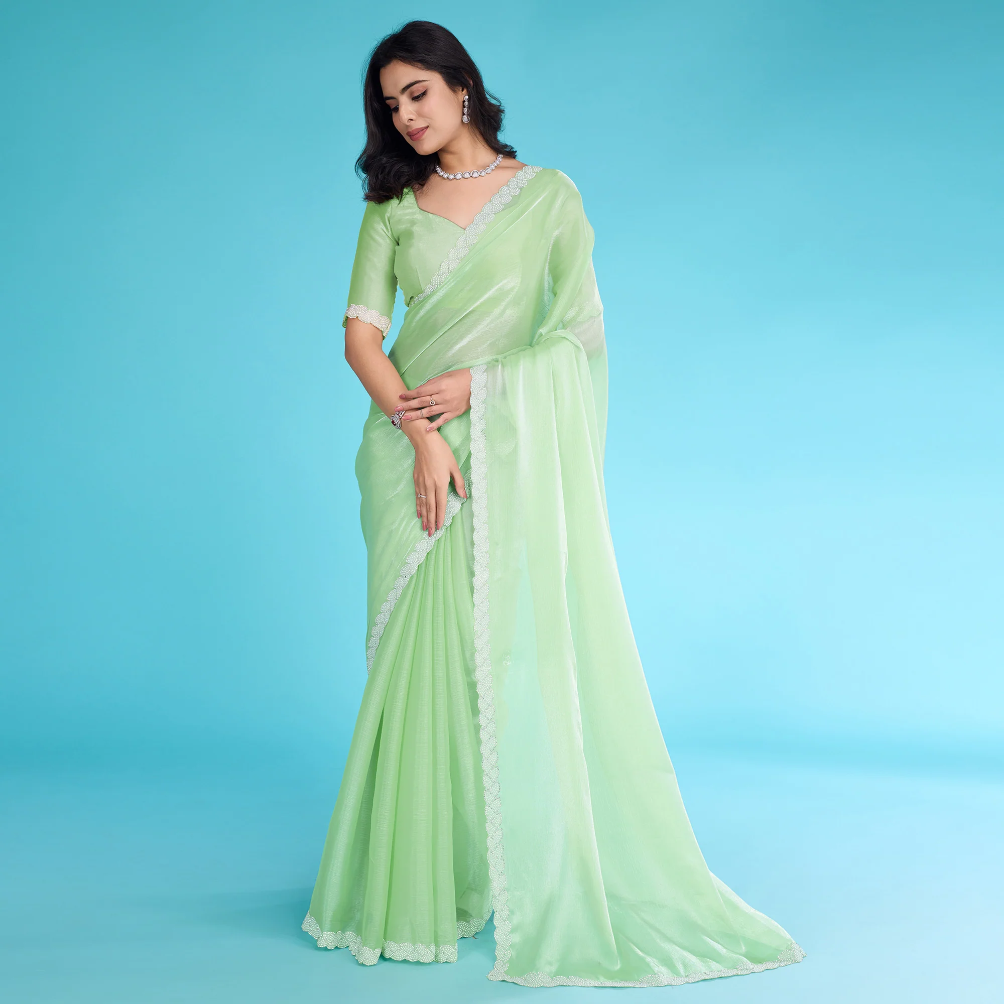 Green Solid With Zarkan & Ceramic Pearl Diamond Lace Tissue Saree - Image 2