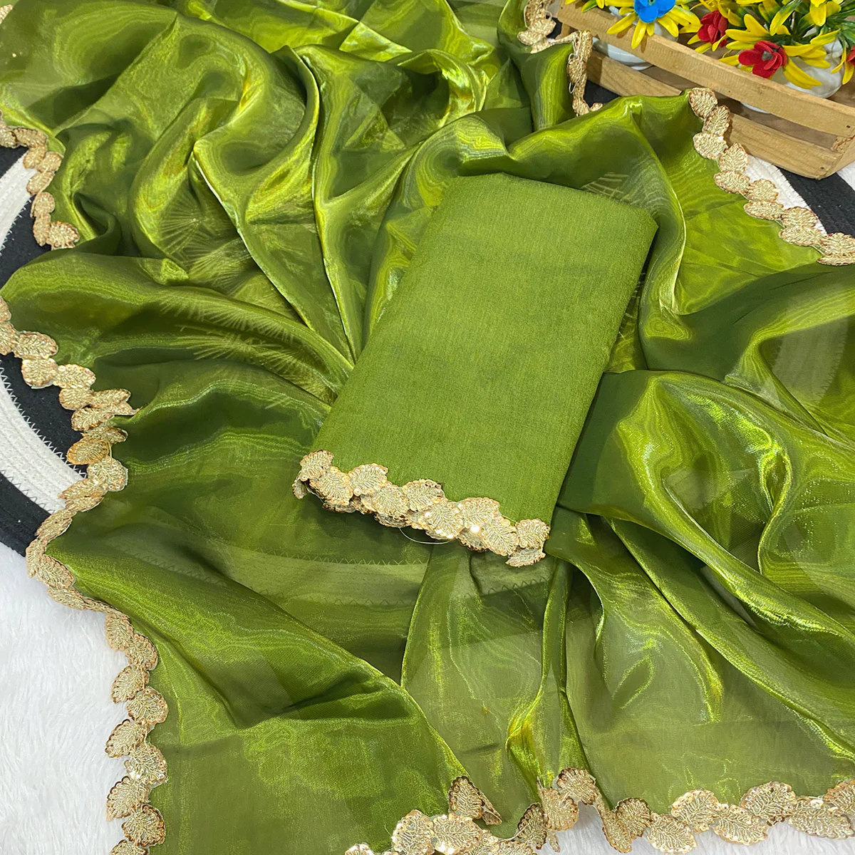 Green Tissue Saree Featuring Solid Finish and Delicate Lace Work by Jimmy Choo Style - Image 2