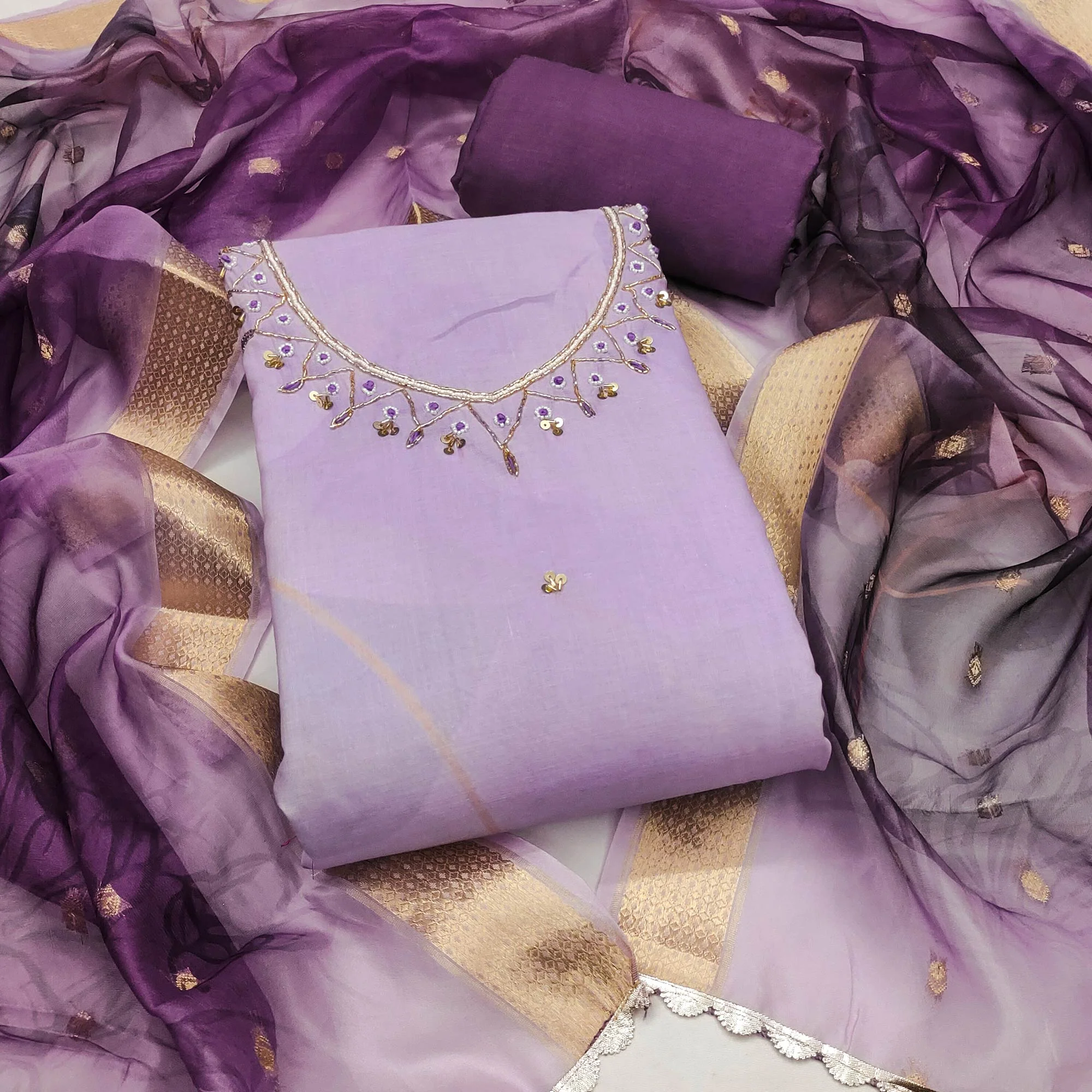 Lavender Cambric Cotton Dress Material Adorned With Floral Prints & Hand Moti Embellishment