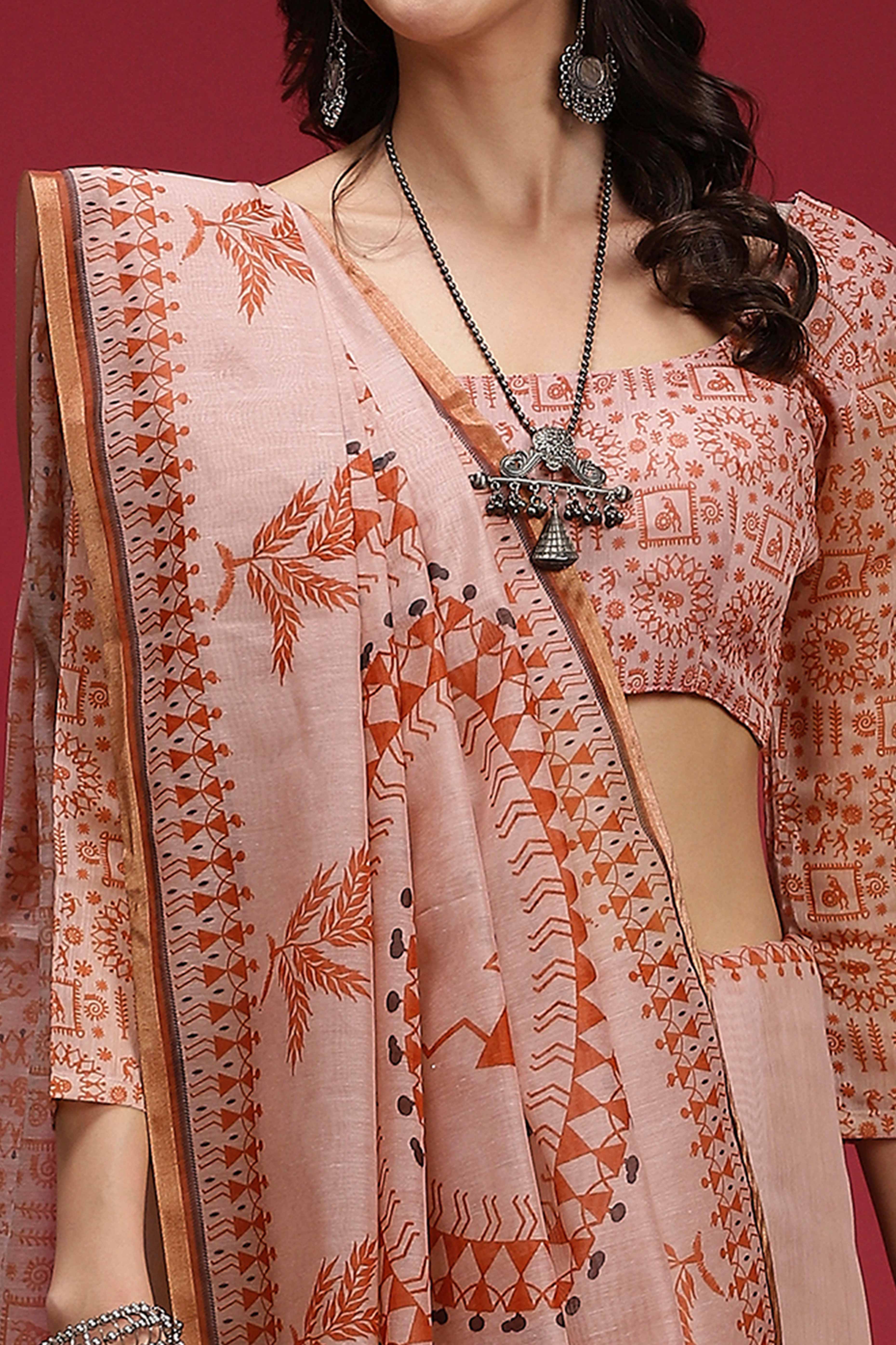 Light Peach Linen Cotton Saree Featuring Traditional Warli Prints & Tassel Pallu - Image 2