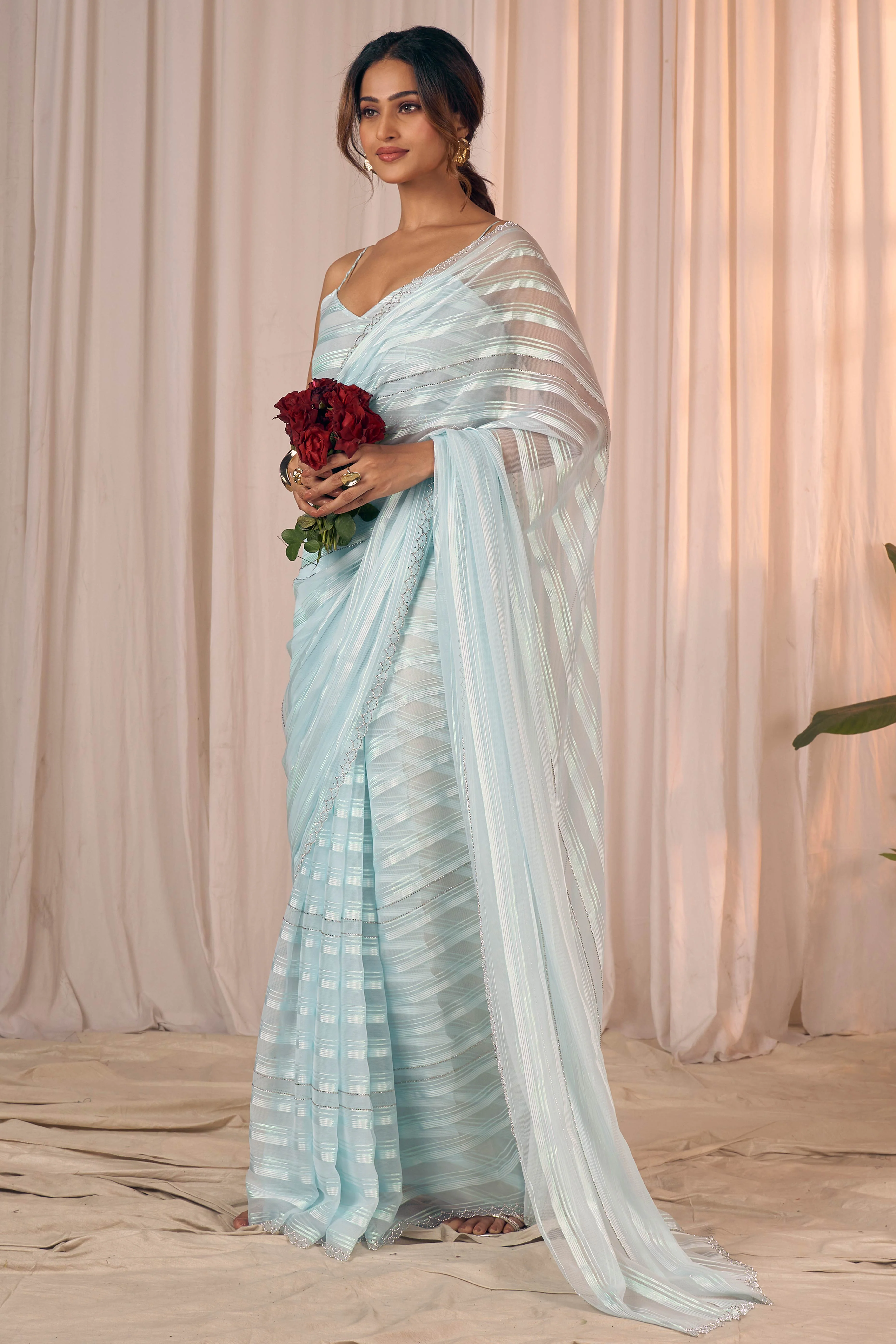 Light Turquoise Striped Georgette Saree With Sparkling Zarkan Work & An Elegant Cutwork Border - Image 4