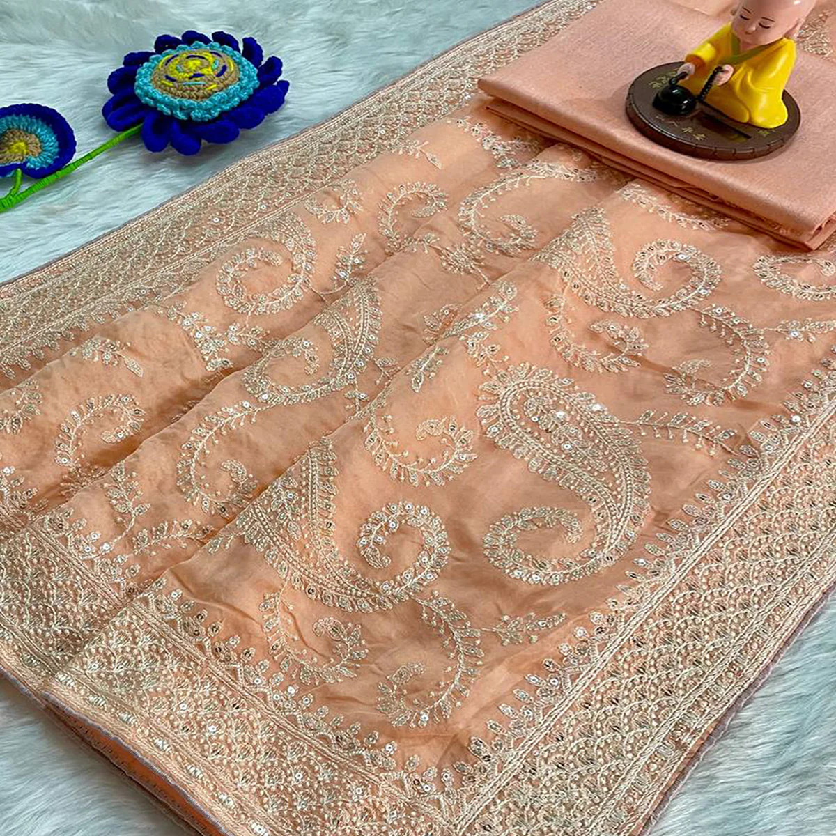 Lustrous Light Orange Organza Silk Saree Beautified With Paisley Embroidery & Glittering Sequins - Image 2