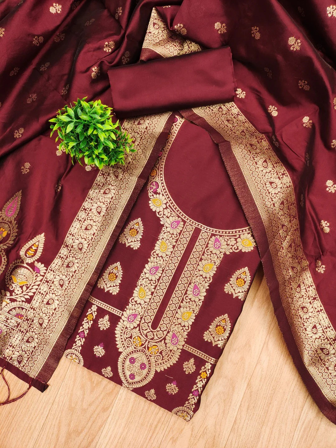 Luxurious Maroon Banarasi Silk Dress Material Showcasing Rich Floral Zari Weaving Design