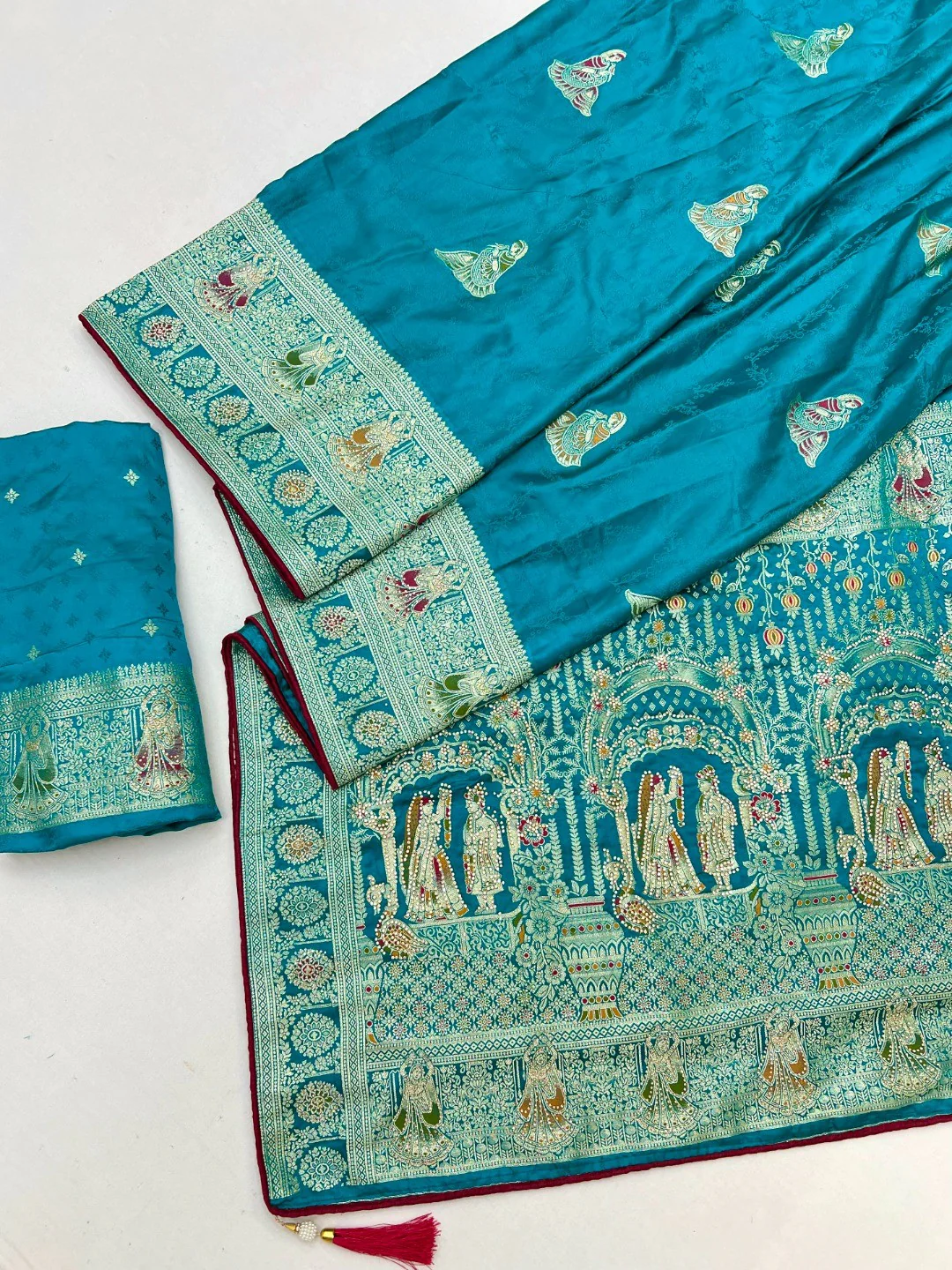 Luxurious Peacock Blue Satin Saree With Artistic Weaving Design & Gleaming Stone Work Accents - Image 3