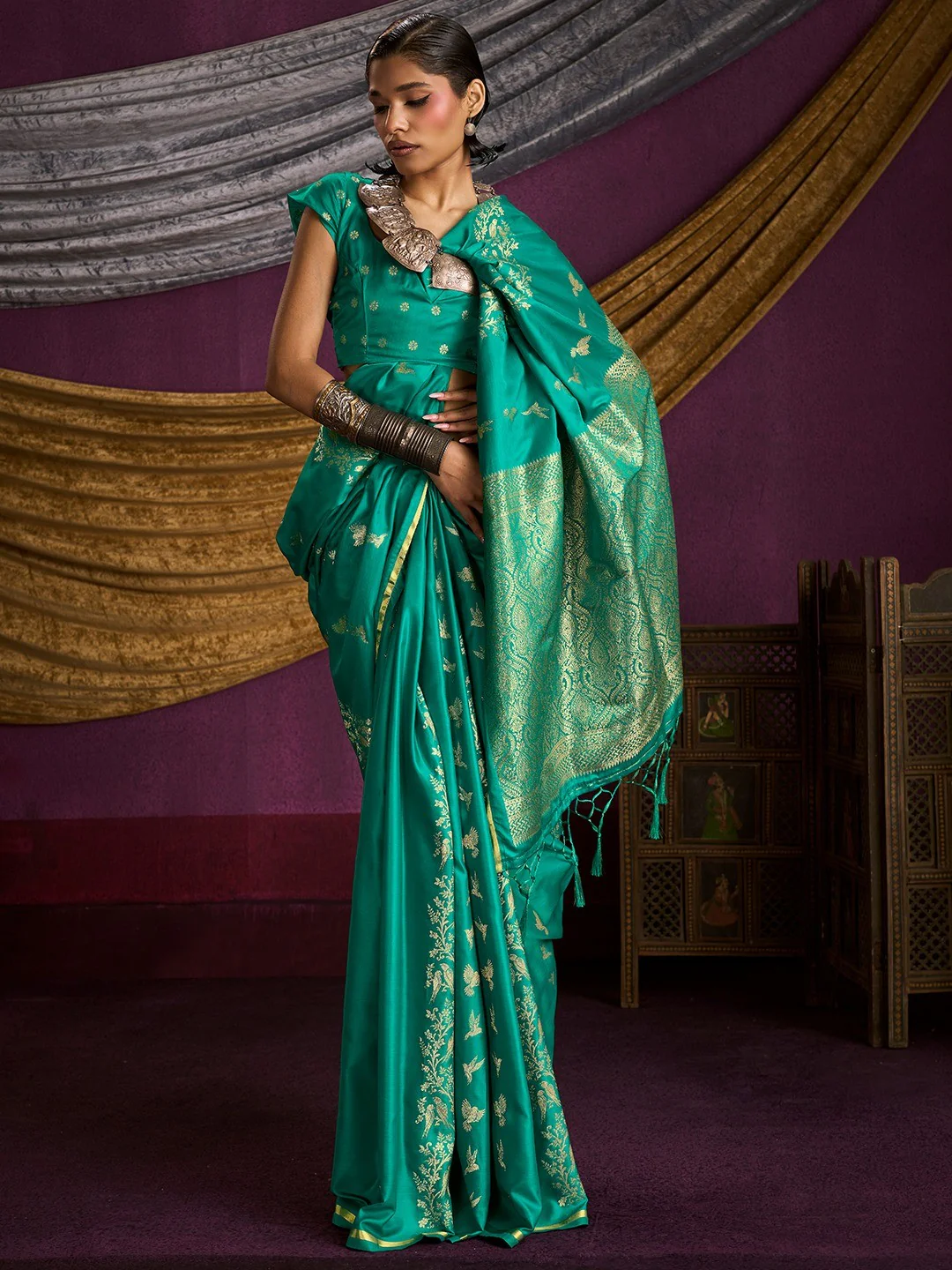 Majestic Rama Green Floral Weaving Work Satin Saree Featuring Designer Tassels Pallu
