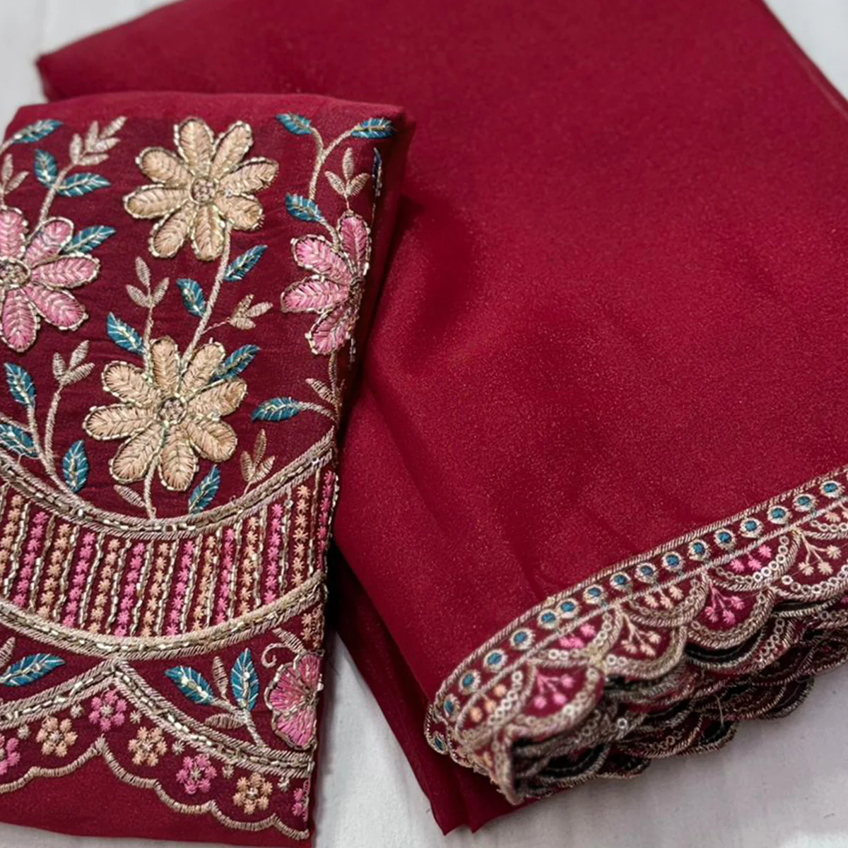 Maroon Solid Georgette Saree With Embroidered Blouse Piece And Embroidered Border - Image 2