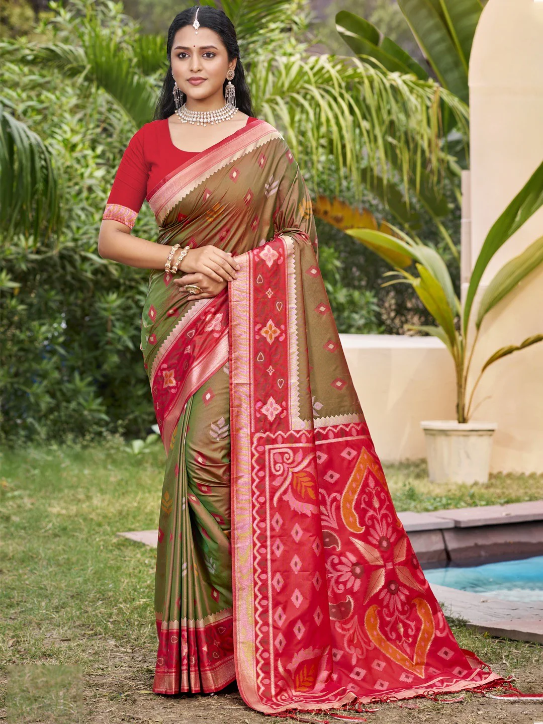 Mehendi Green Silk Blend Saree Featuring Classic Ikkat Print and Intricate Woven Design Finish
