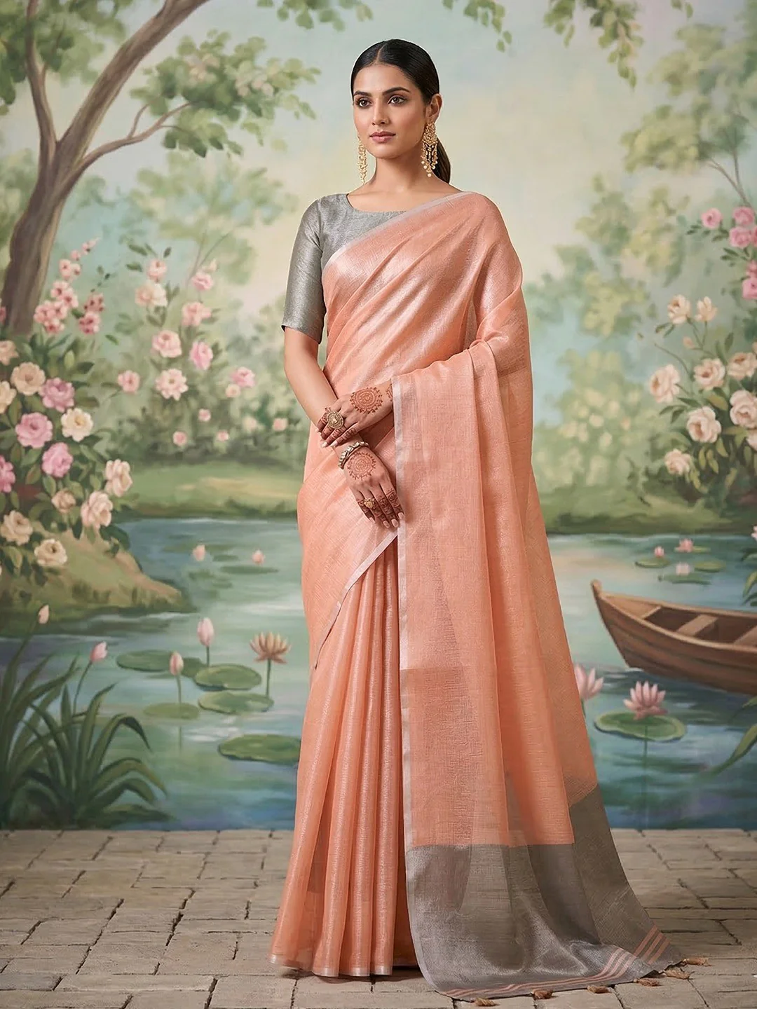Modern Peach Tissue Saree with Elegant Grey Border and Stylish Tassels