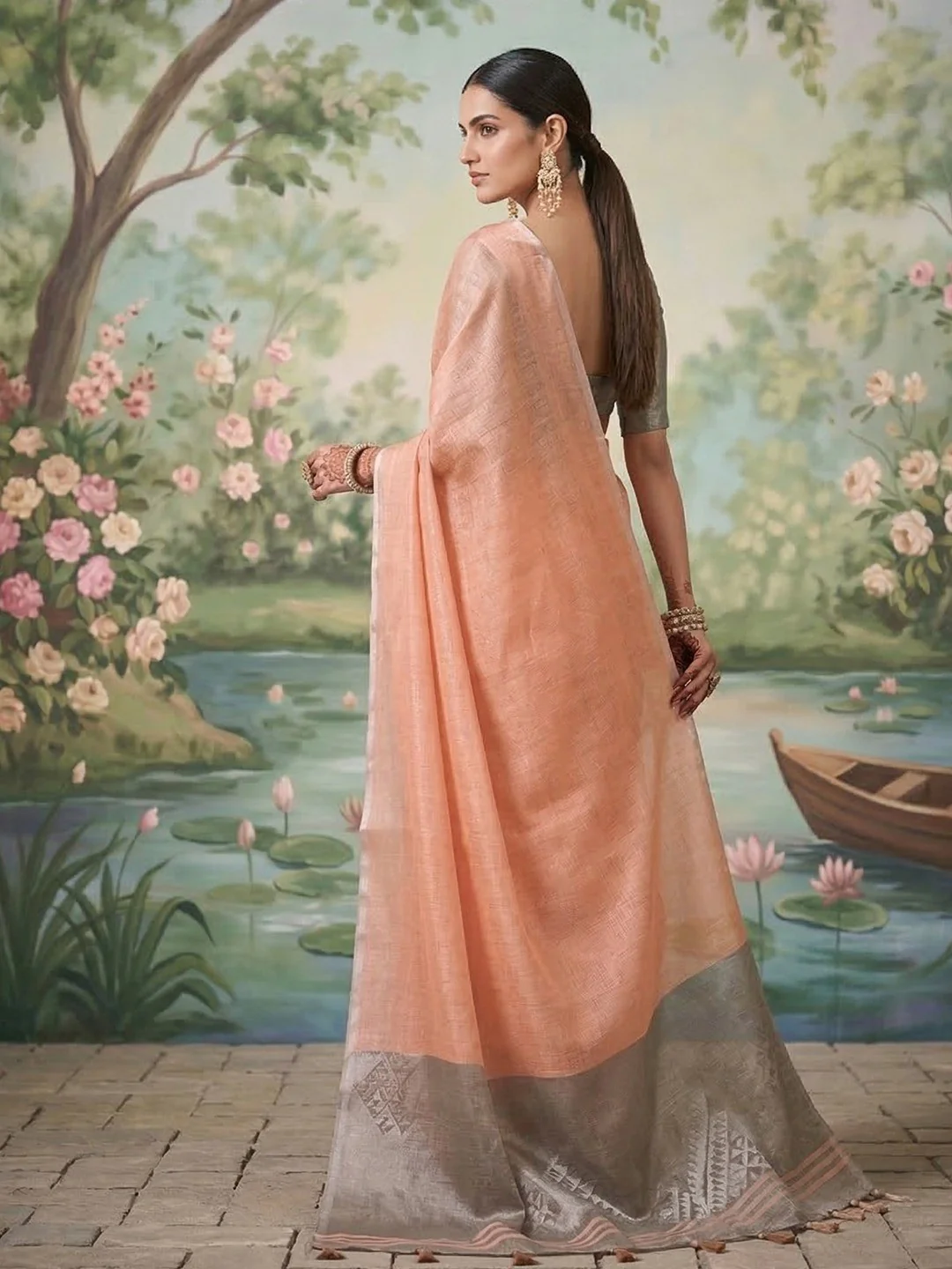 Modern Peach Tissue Saree with Elegant Grey Border and Stylish Tassels - Image 3