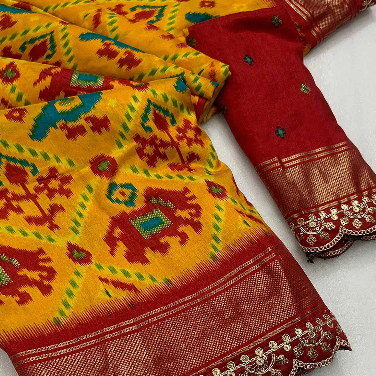 Mustard & Red Ikkat Printed Dola Silk Saree With Sequins Embroidery Border - Image 2