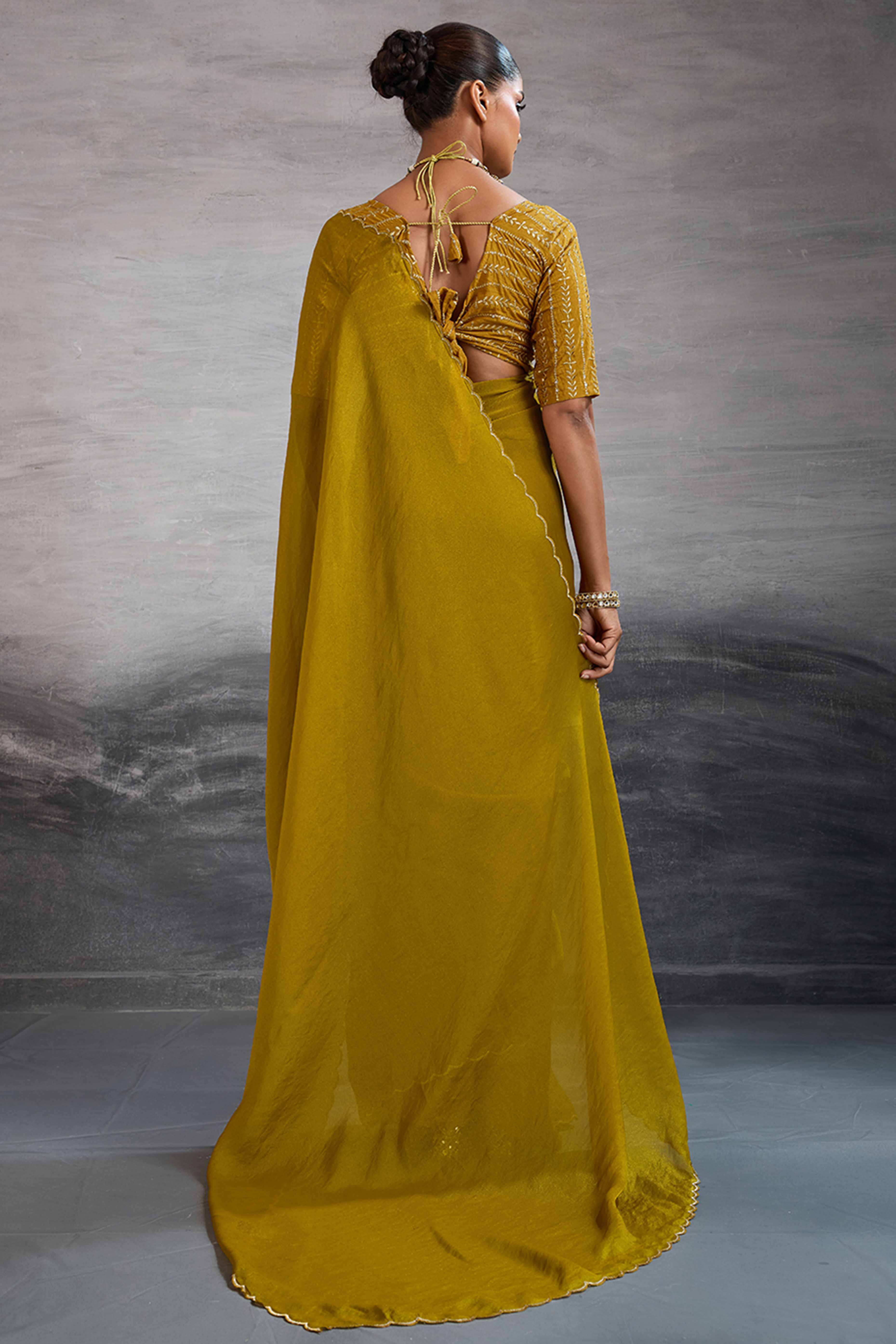 Mustard Solid Organza Jimmy Choo Saree Accentuated With Elegant Cutwork Border Detailing - Image 5
