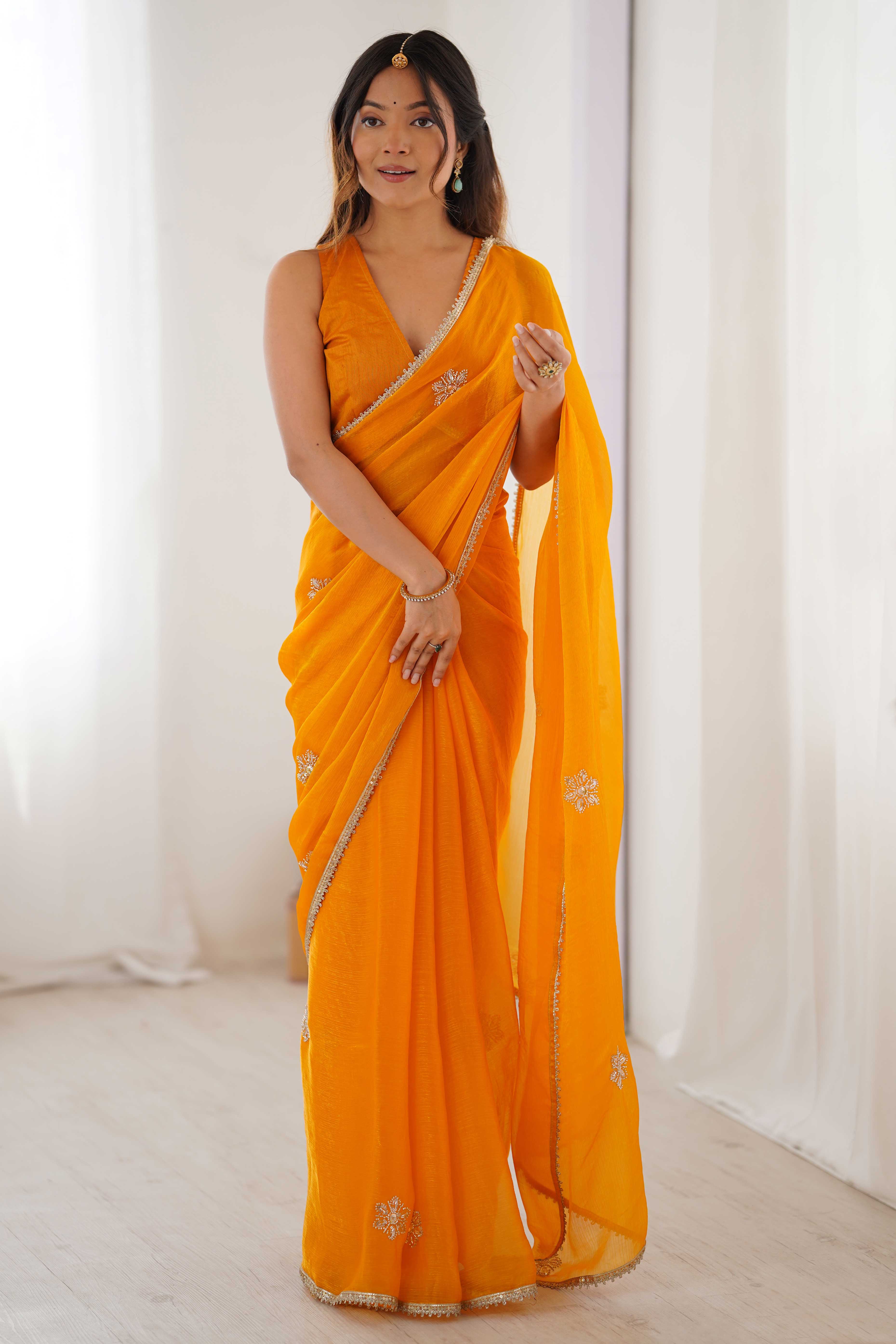 Mustard Yellow Organza Saree Embellished with Intricate Floral Work and Elegant Lace Detailing