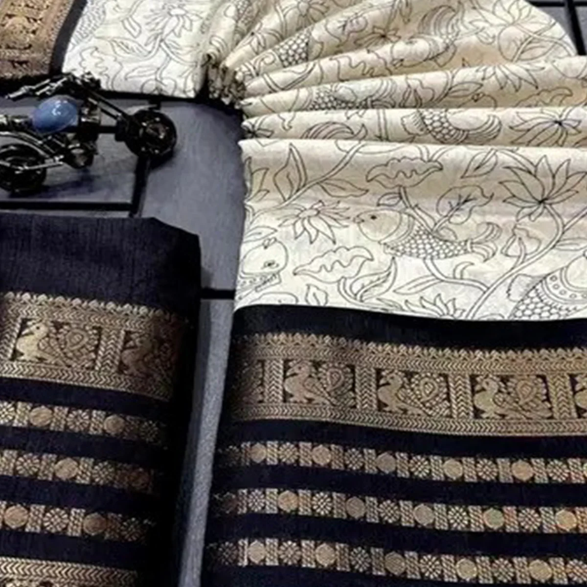 Off White & Black Floral Printed Dola Silk Saree With Zari Border - Image 2