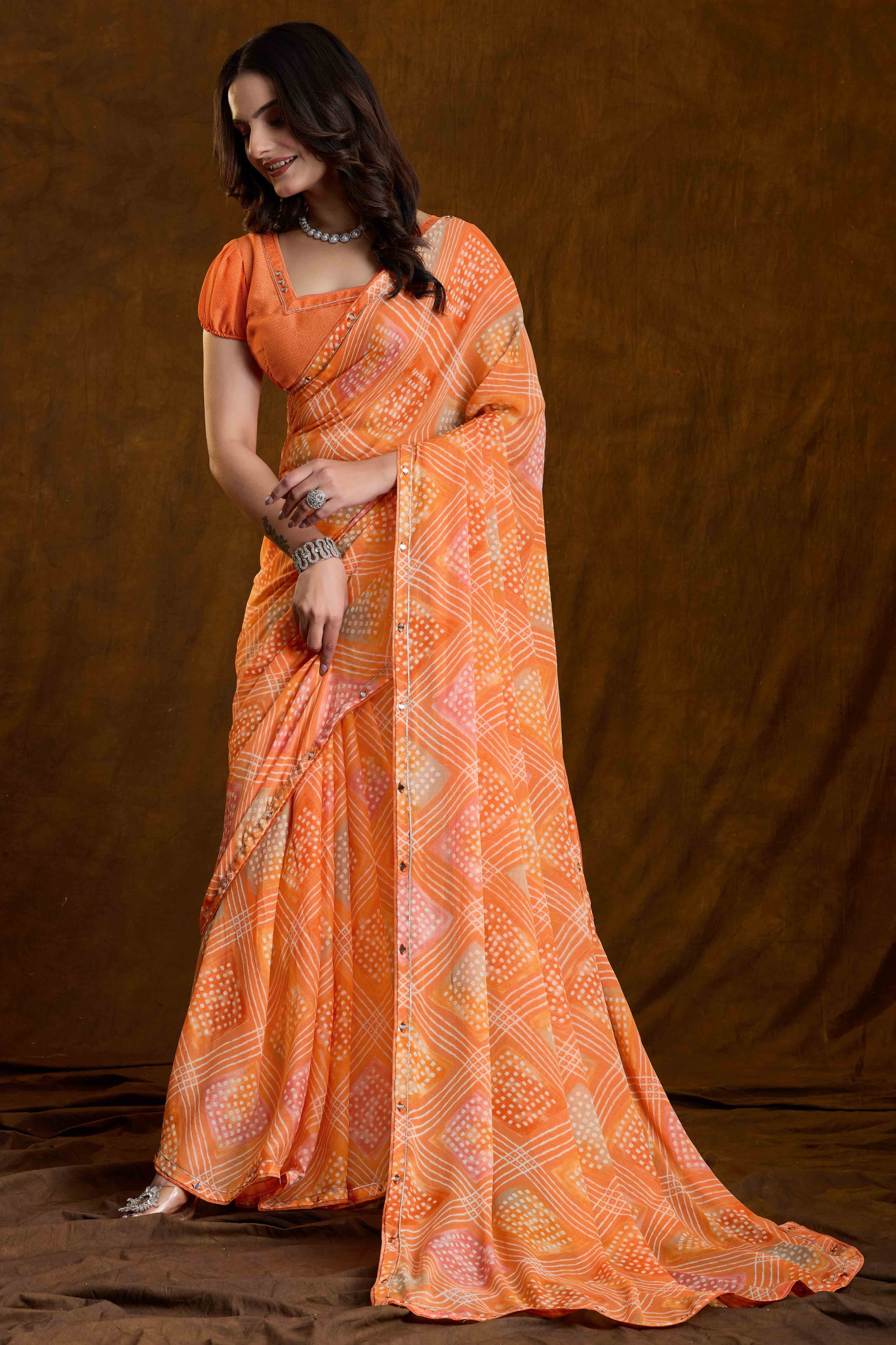 Orange Bandhani Printed Chiffon Saree With Sparkling Mirror Work Border