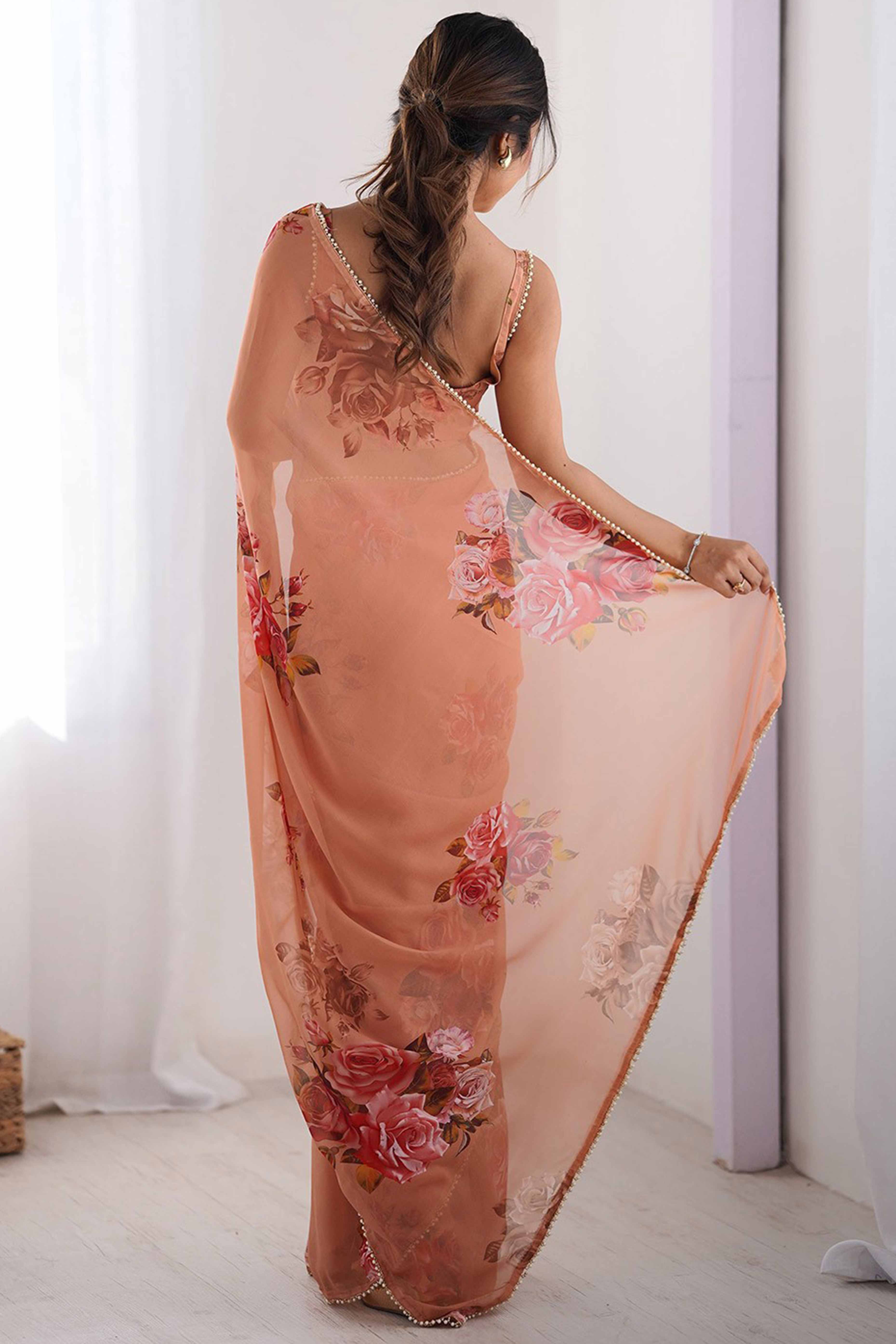 Partywear Peach Georgette Saree with Floral Prints and Bead Work Lace - Image 3