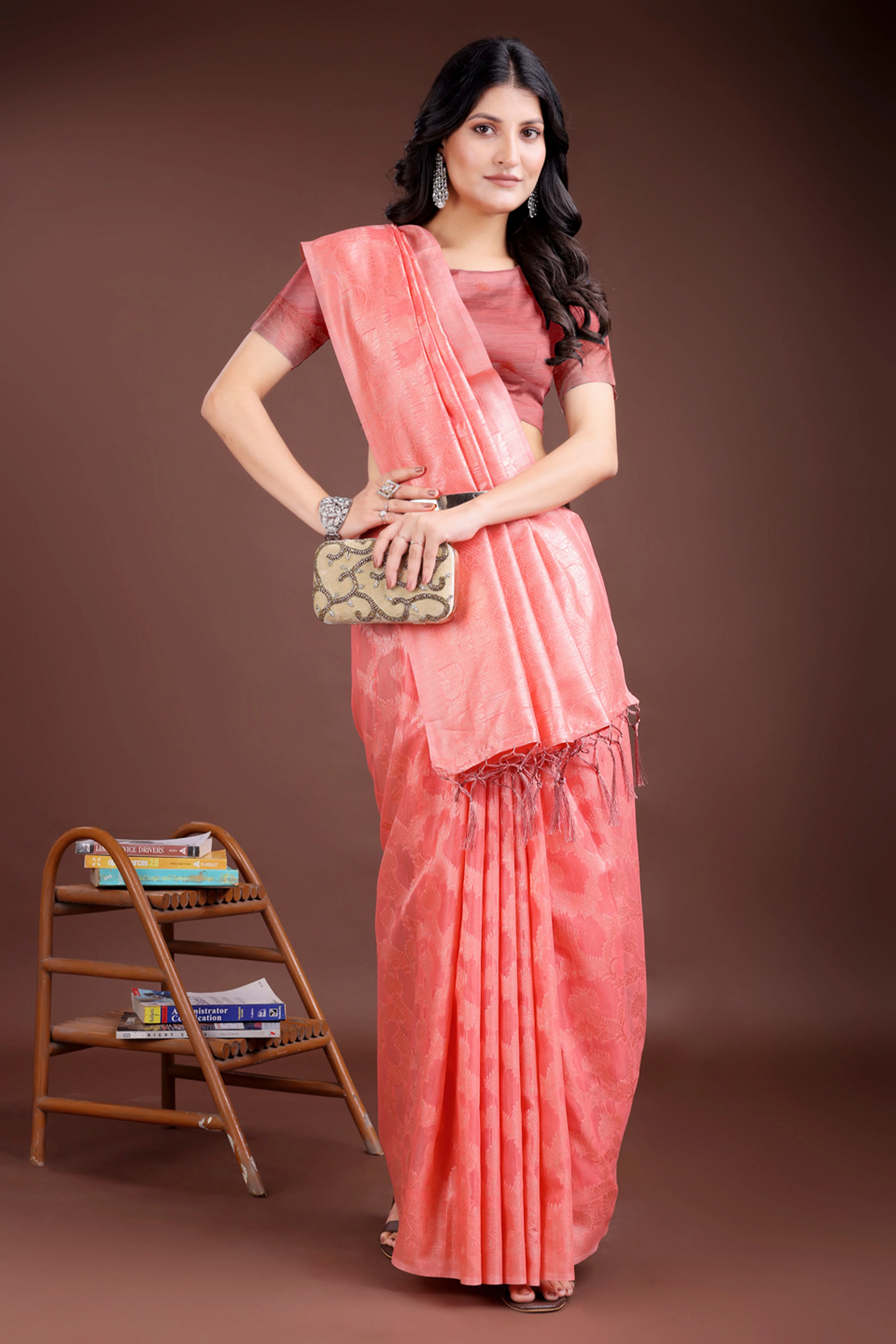Peach Linen Cotton Saree with Lustrous Zari Borders and Elegant Tassel Accents