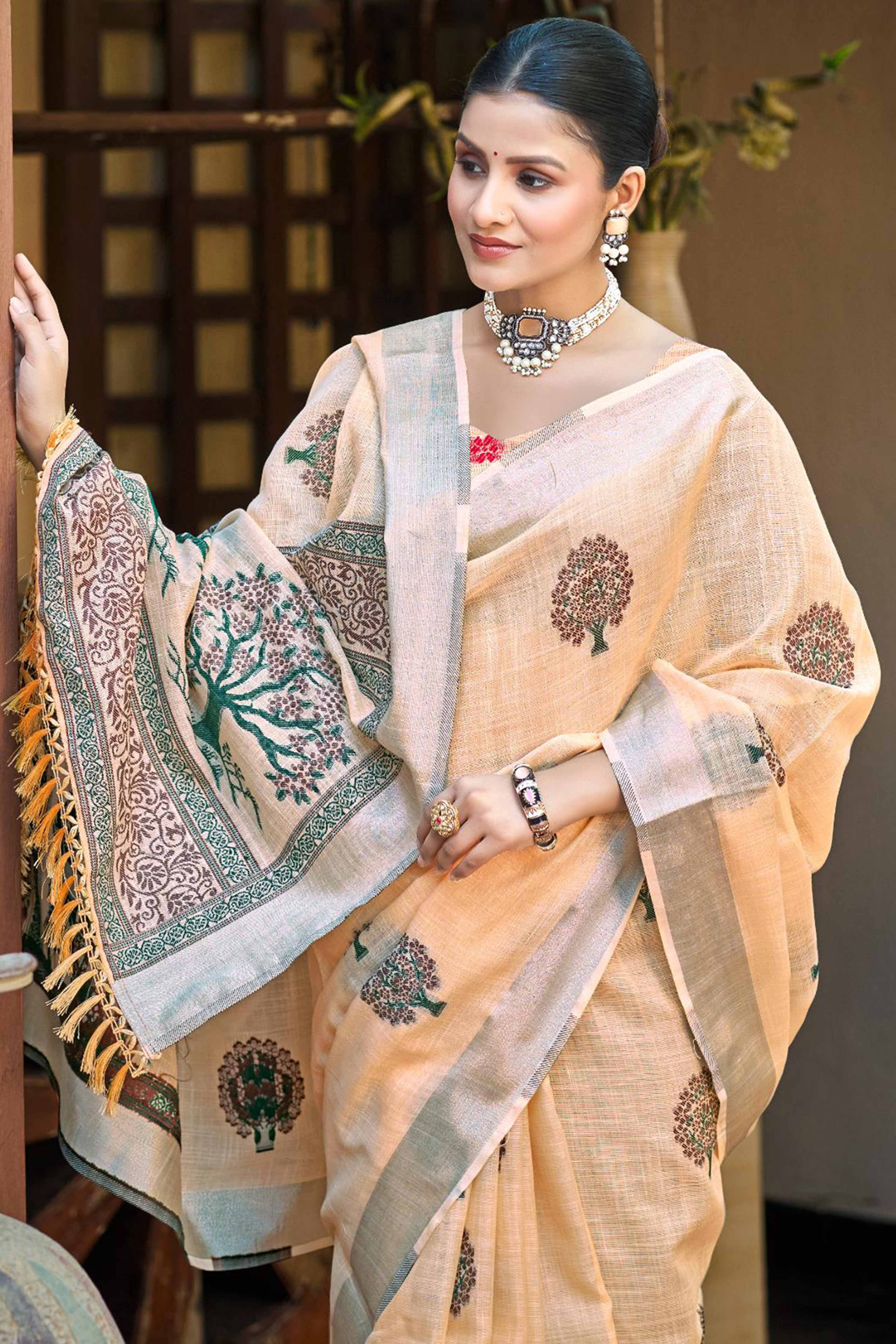 Peach Linen Saree Adorned With Intricate Zari Weaving & Tassel Pallu - Image 3