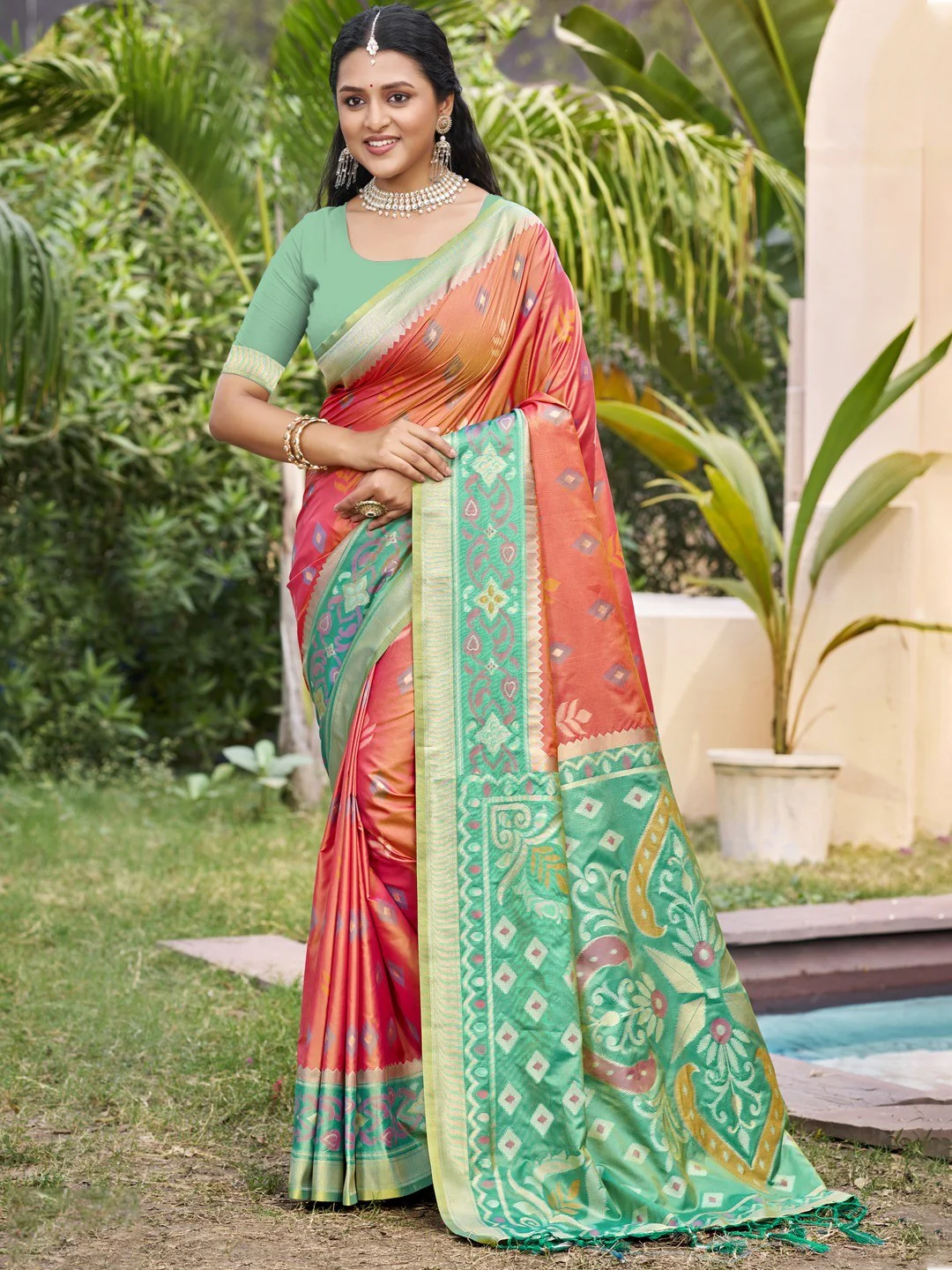 Peach Silk Blend Saree Featuring Classic Ikkat Print and Intricate Woven Design Finish