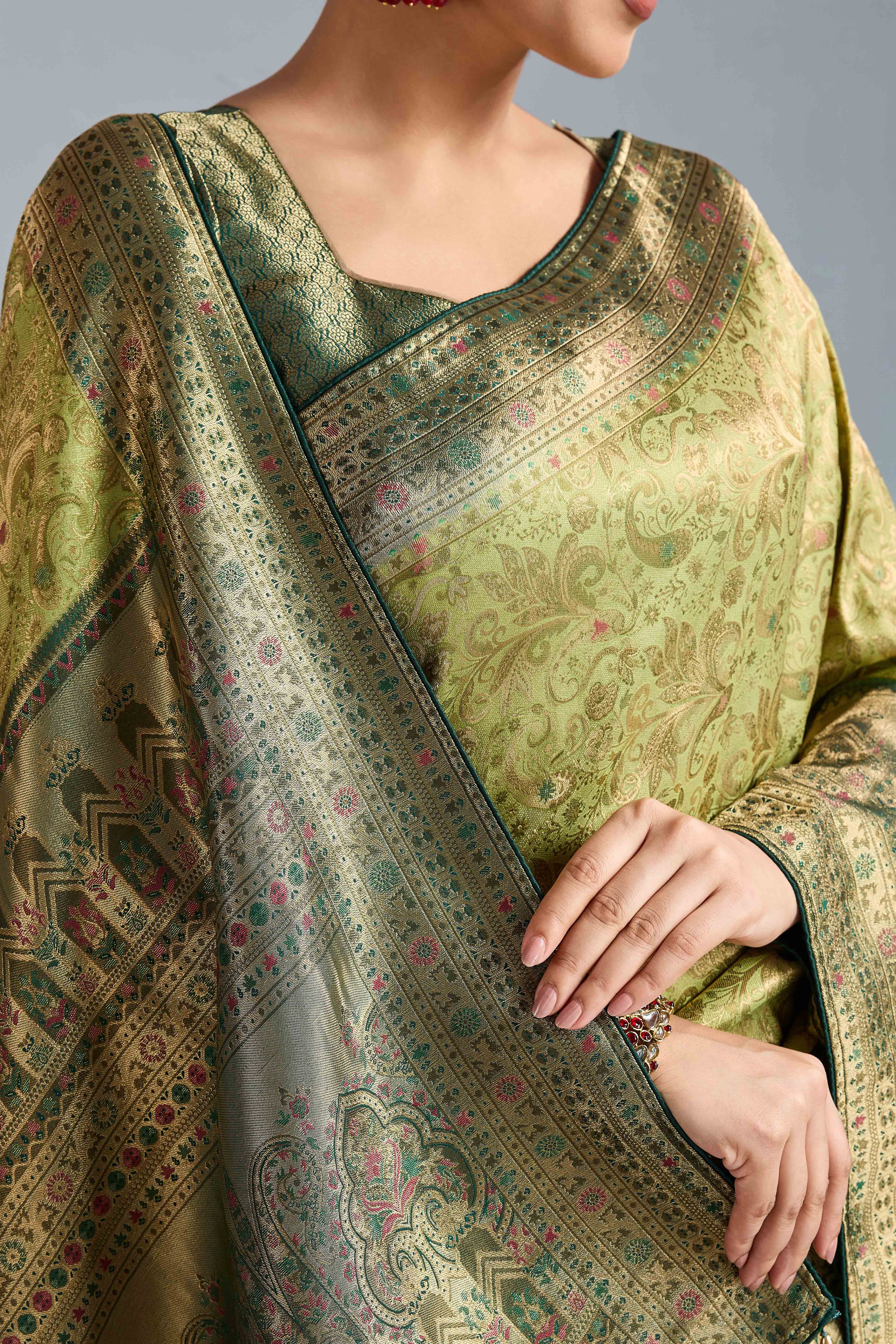 Pista Green Floral Meenakari Weaving Kanjivaram Silk Saree With Rich Piping & Tassel Pallu - Image 2