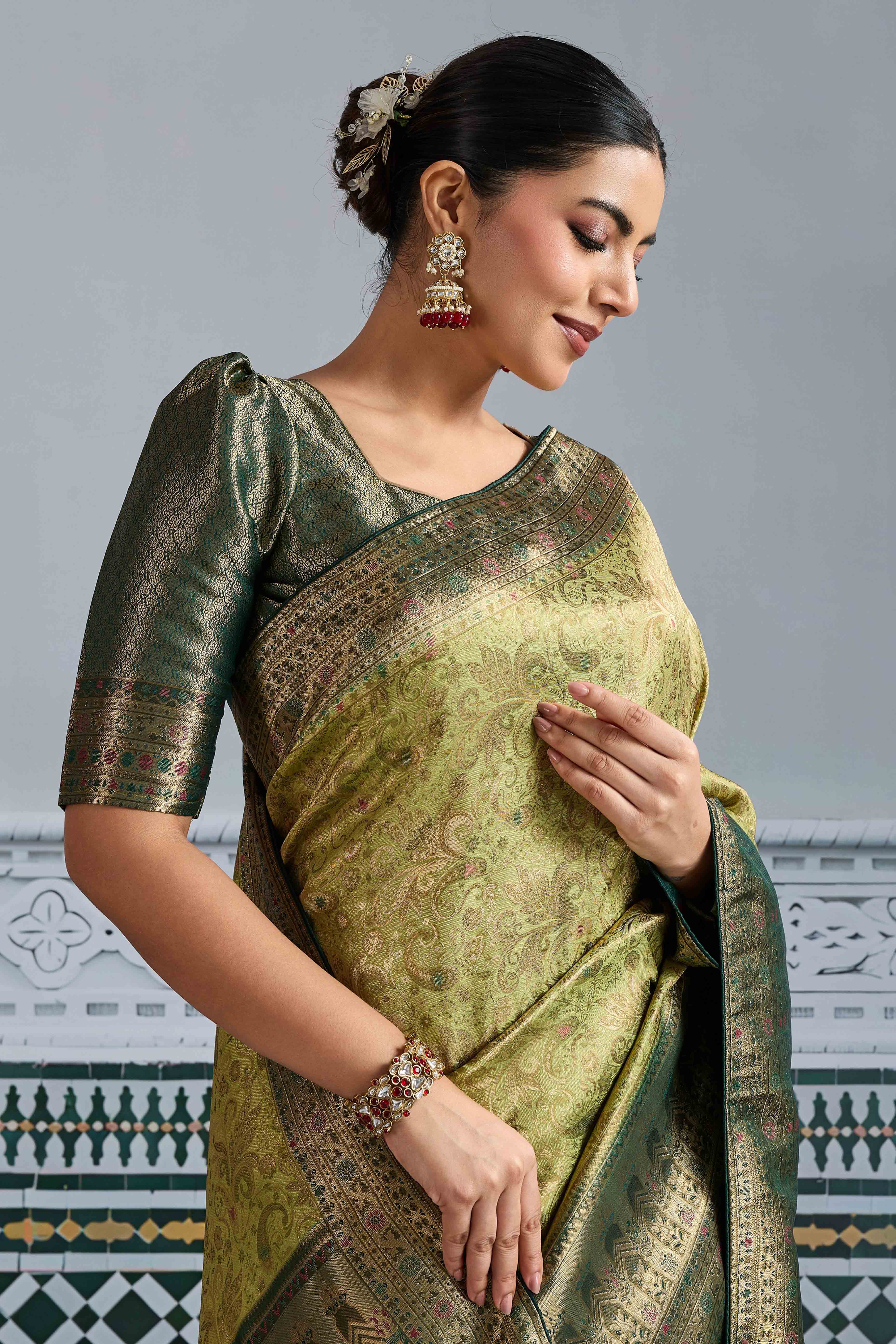 Pista Green Floral Meenakari Weaving Kanjivaram Silk Saree With Rich Piping & Tassel Pallu - Image 6