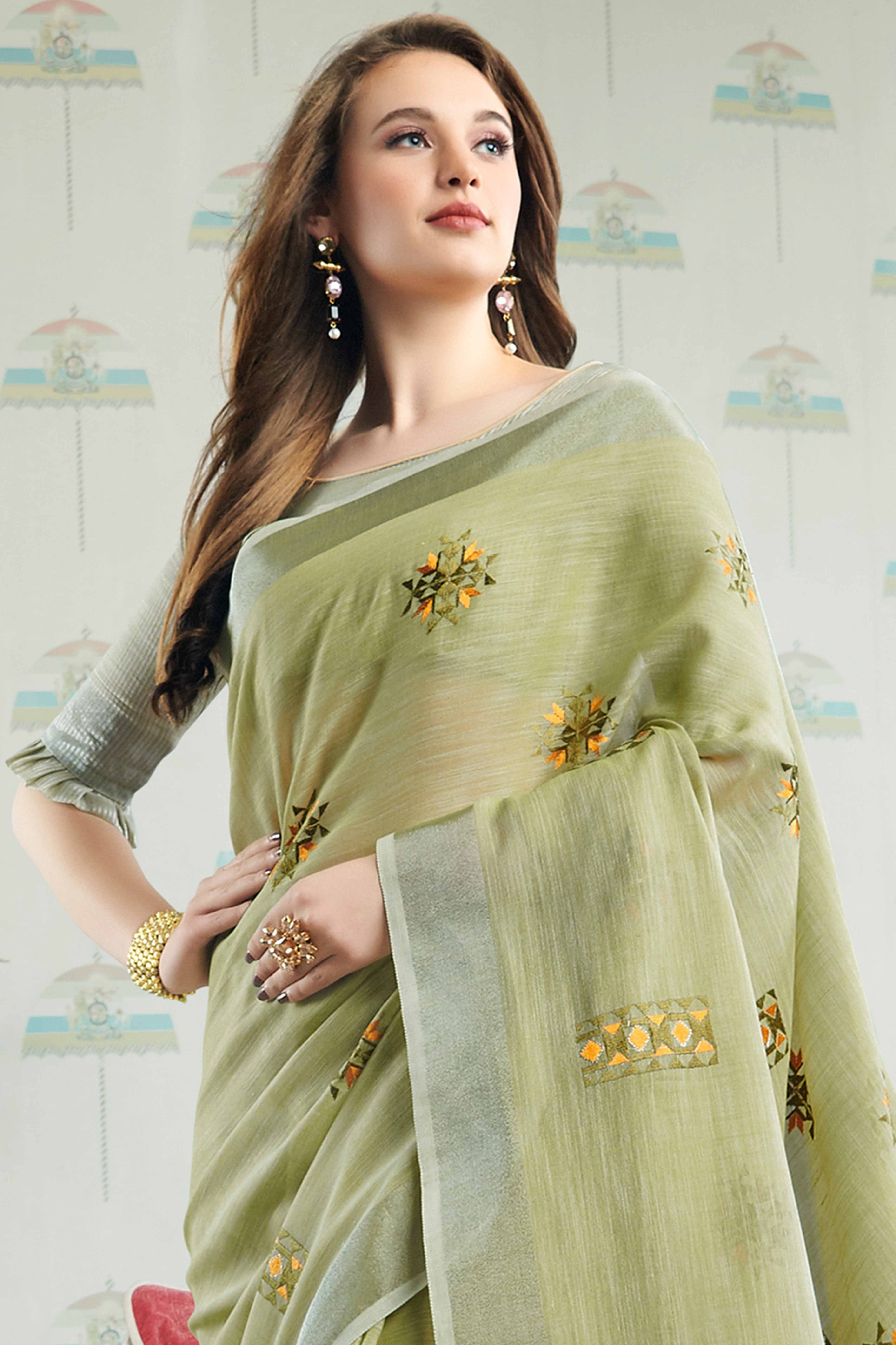 Pista Green Linen Saree with Intricate Floral Embroidery and Classic Weaving - Image 3