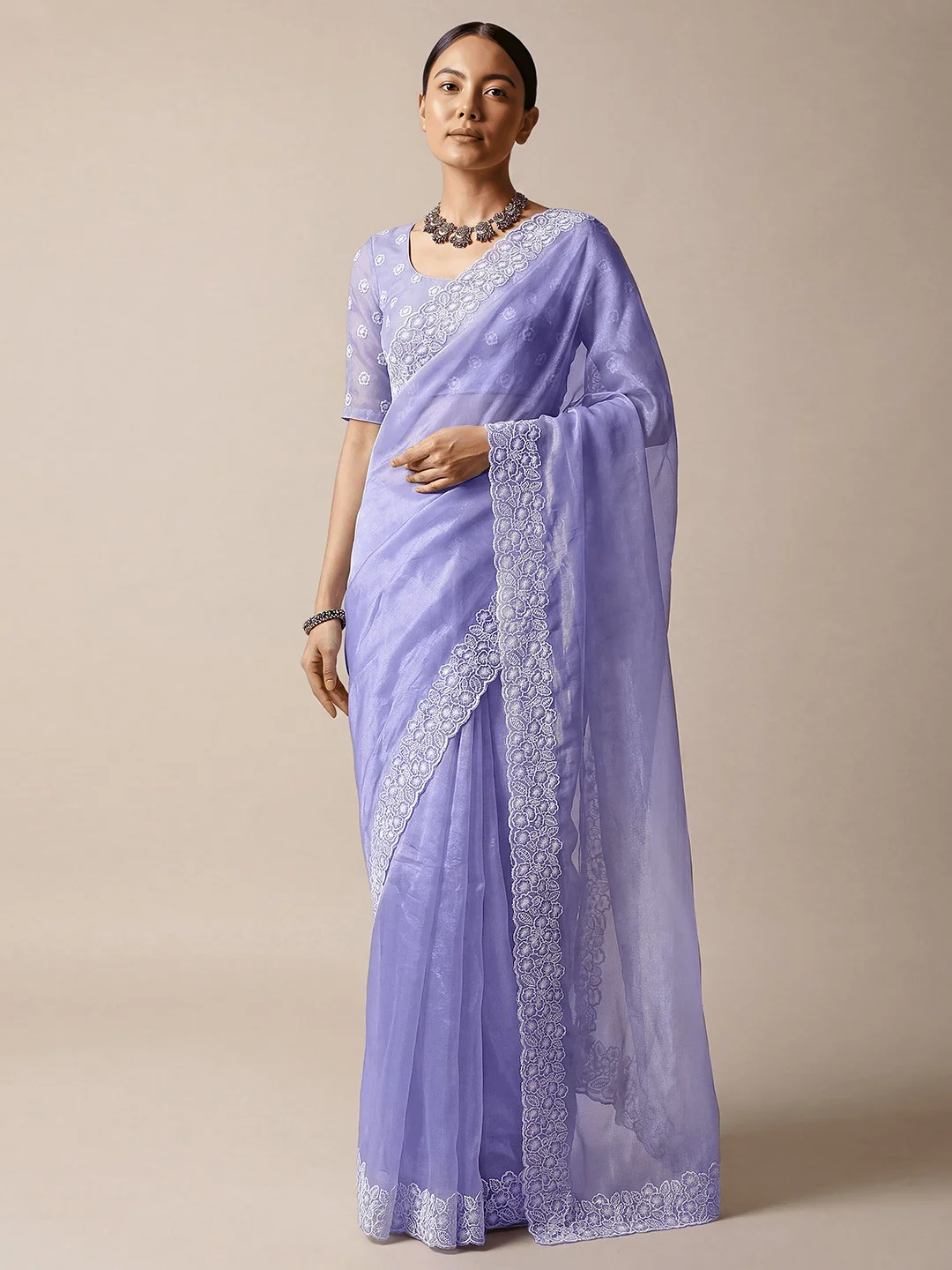 Premium Lavender Solid Twill Net Saree Accentuated With Floral Embroidered Border Detailing