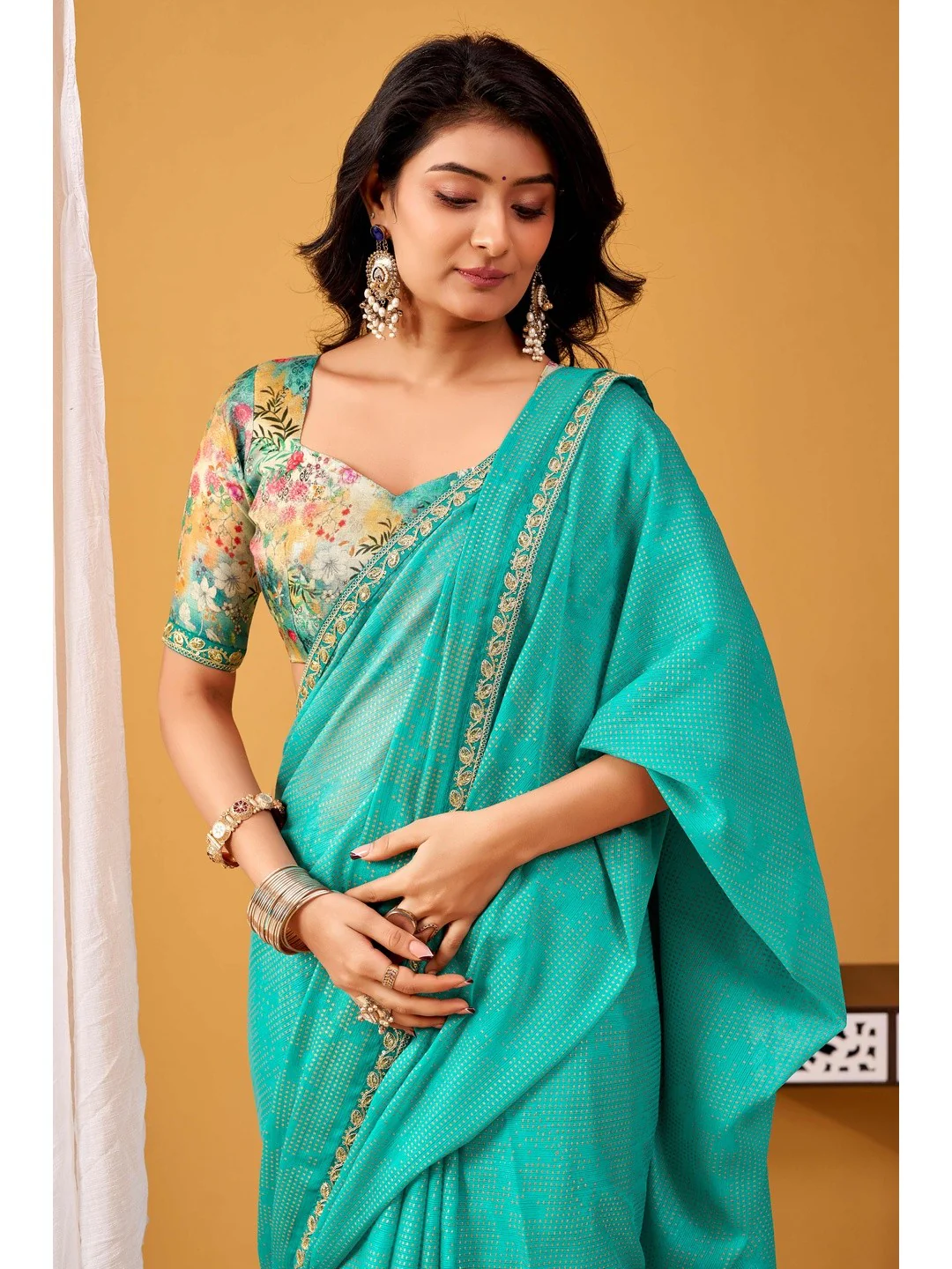 Radiant Turquoise Foil Printed Chiffon Saree Accented With Elegant Sequins Embroidered Border Work - Image 4