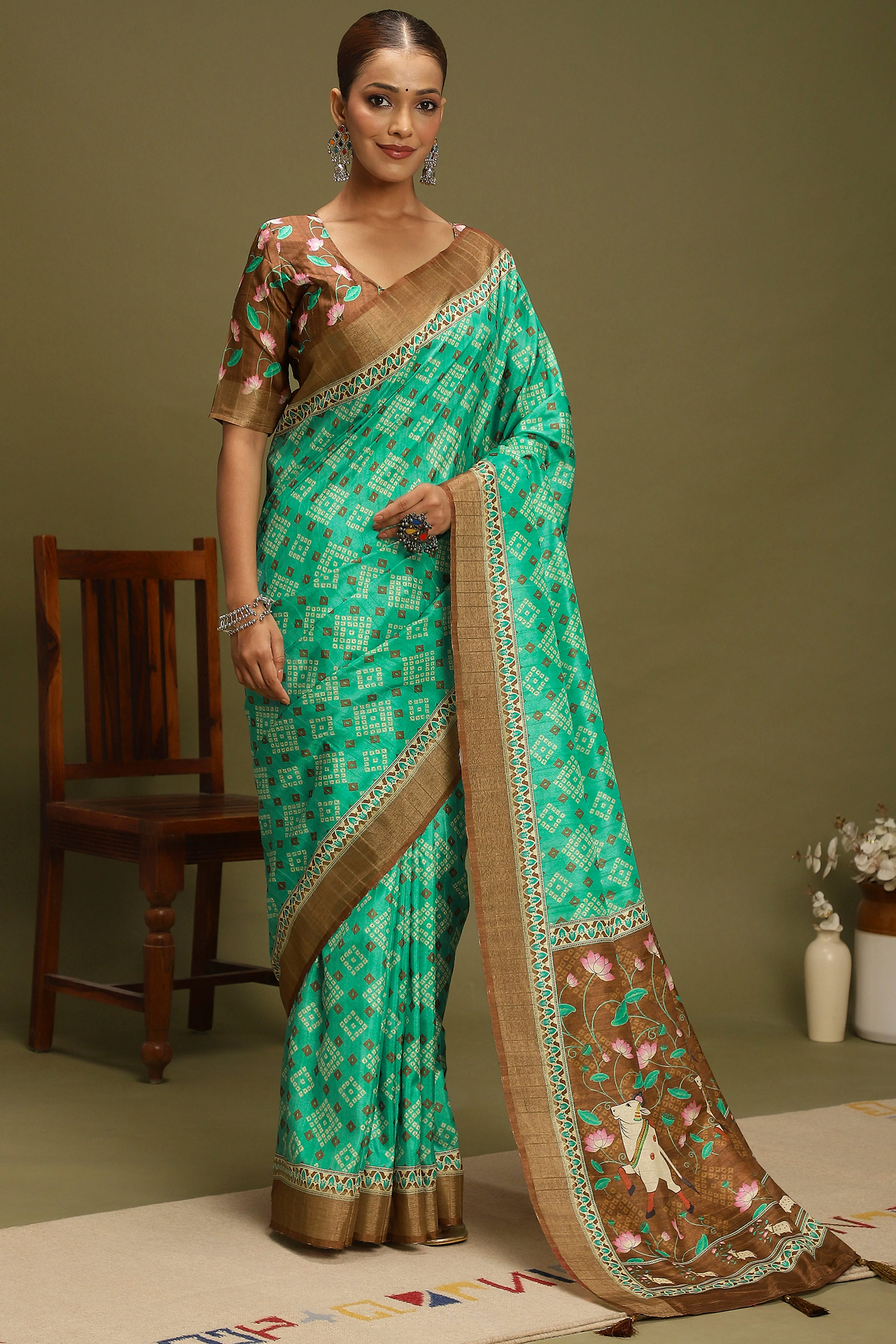 Rama Green Silk Blend Saree Decorated with Vibrant Bandhani Prints and Festive Detailing
