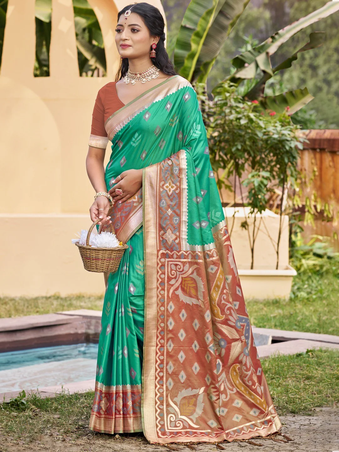 Rama Green Silk Blend Saree Featuring Classic Ikkat Print and Intricate Woven Design Finish