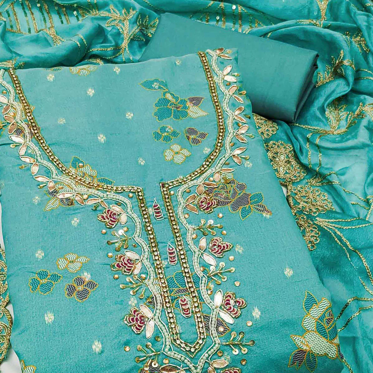 Rama Green Unstitched Dress Material in Shimmer Cotton Silk with Delicate Thread Work Embroidery - Image 2