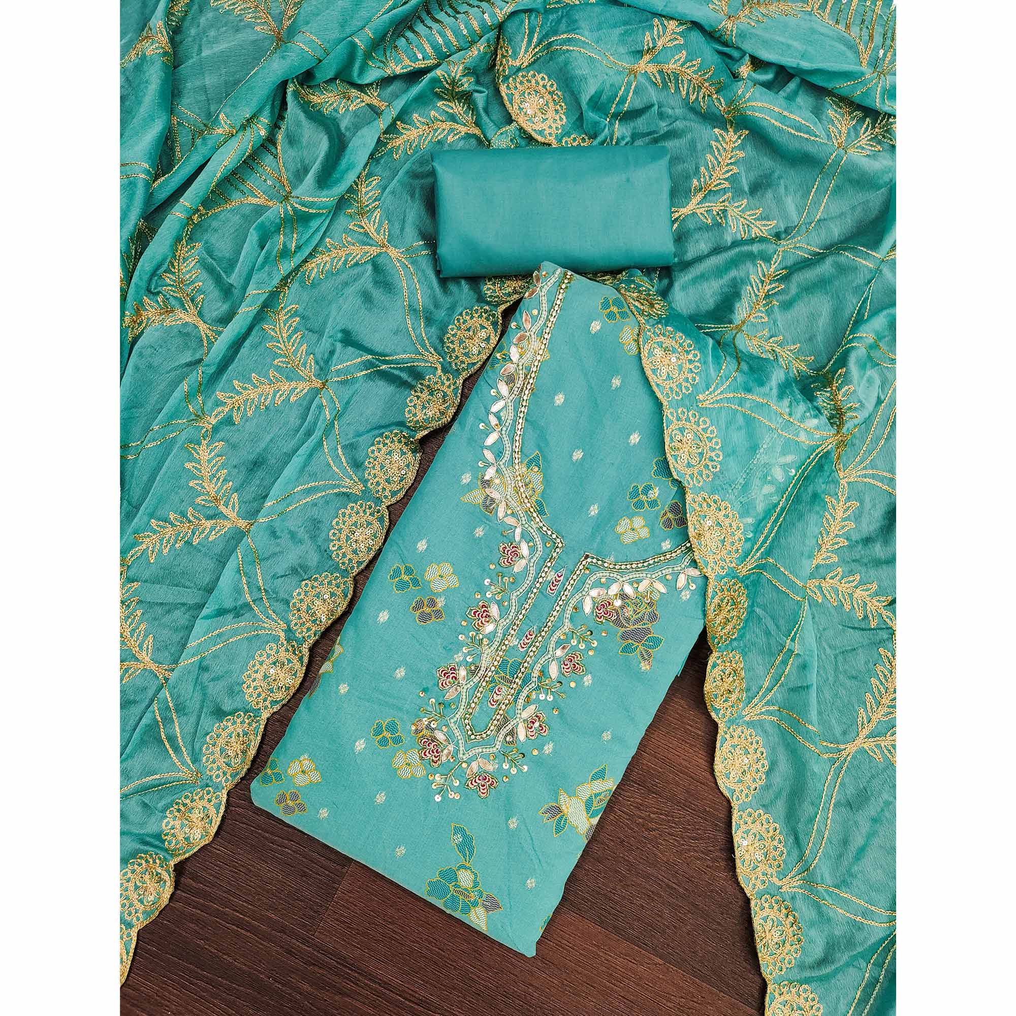 Rama Green Unstitched Dress Material in Shimmer Cotton Silk with Delicate Thread Work Embroidery - Image 3