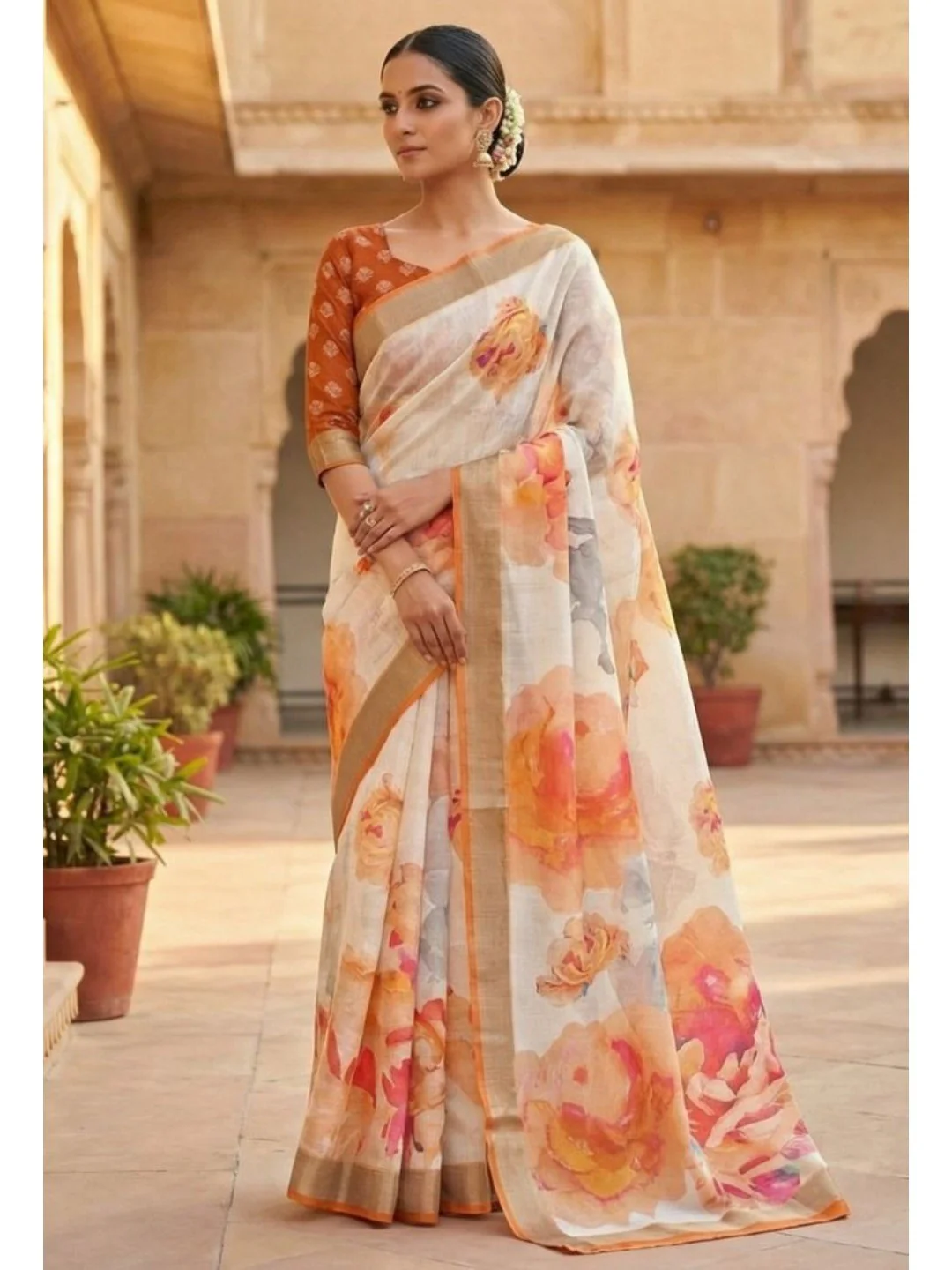 Refreshing Orange Floral Digital Printed Linen Saree Accented With A Subtle Silver Border