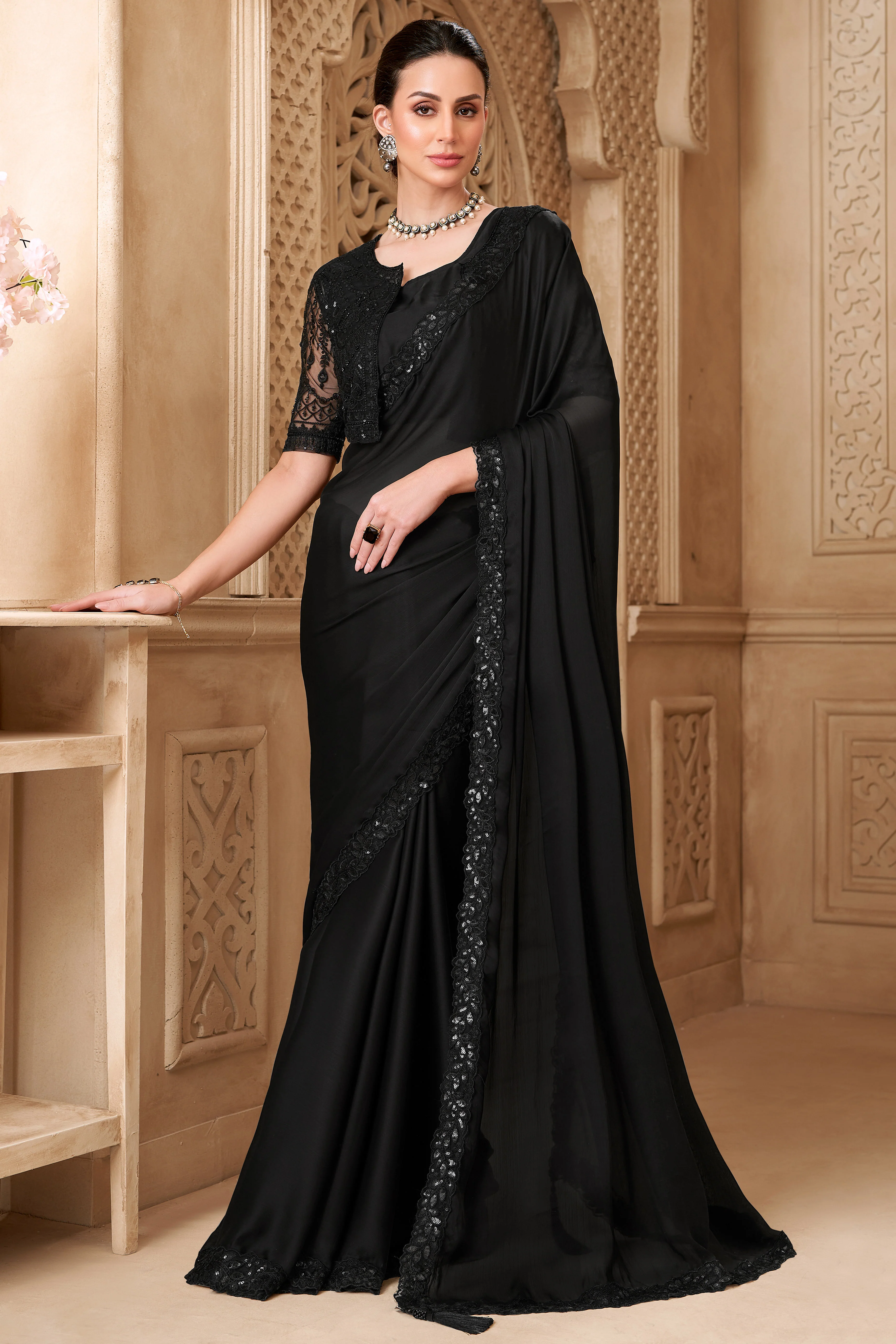 Shimmering Black Georgette Saree with Graceful Thread Embellishment and Sequins