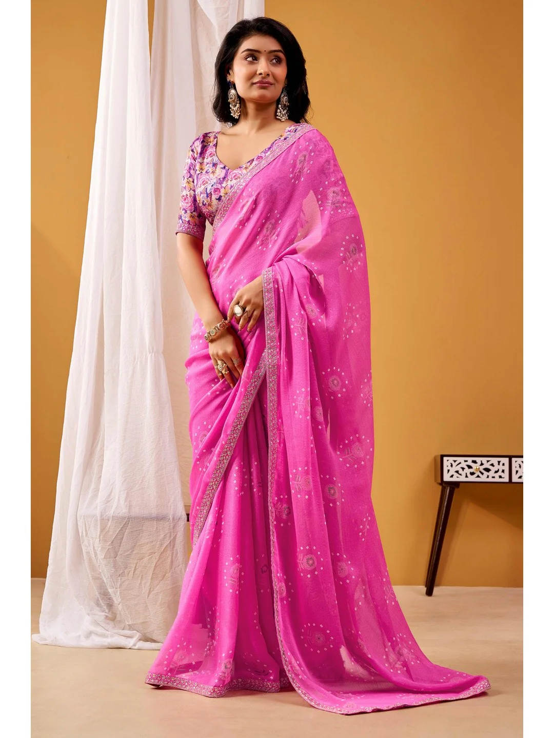 Soft Pink Floral & Bandhani Foil Printed Chiffon Saree Enhanced By Fine Sequins Embroidered Border