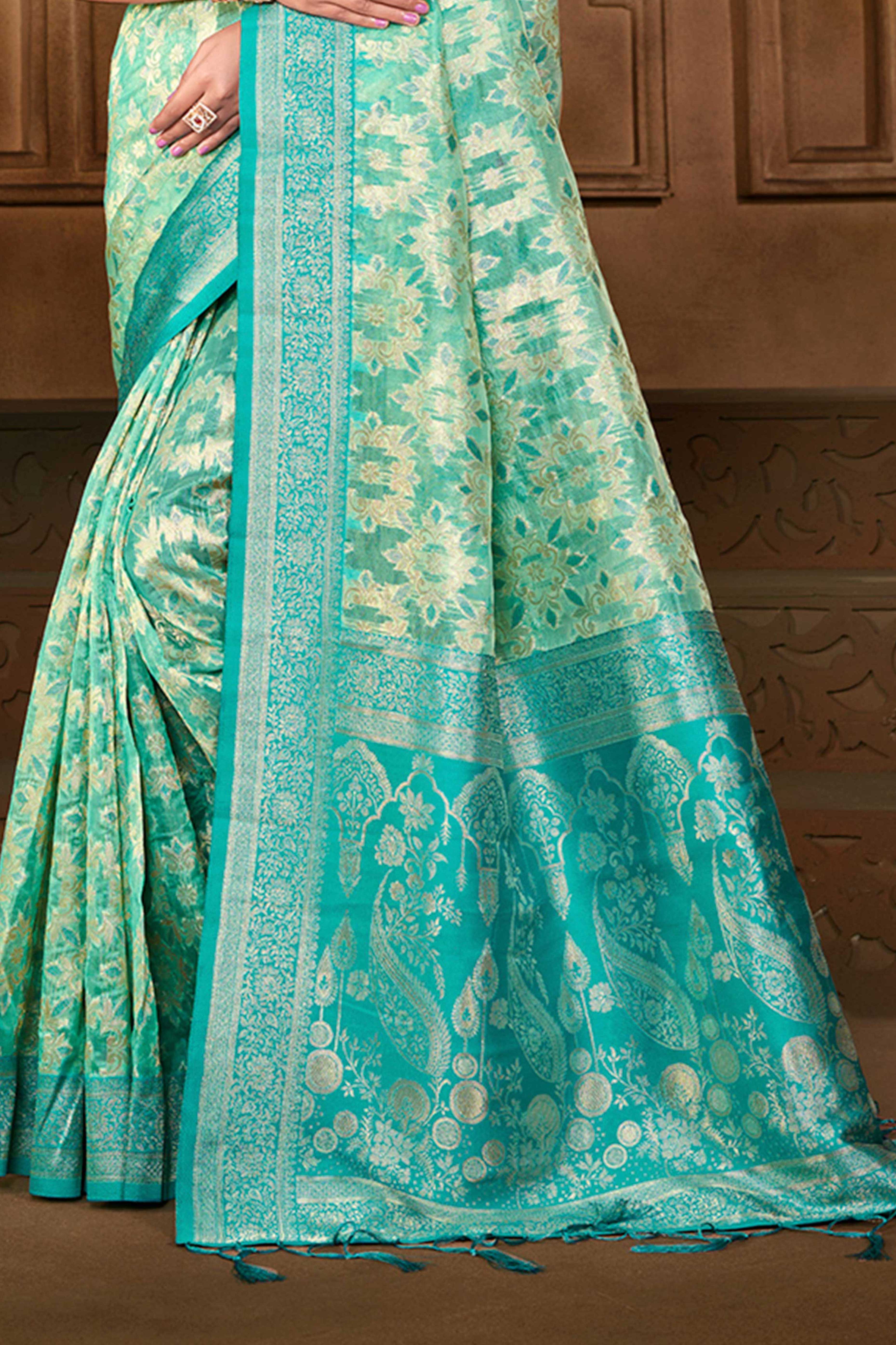 Stunning Turquoise Blue Floral Weaving Silk Blend Saree Enhanced With A Stylish Tassel Pallu - Image 4