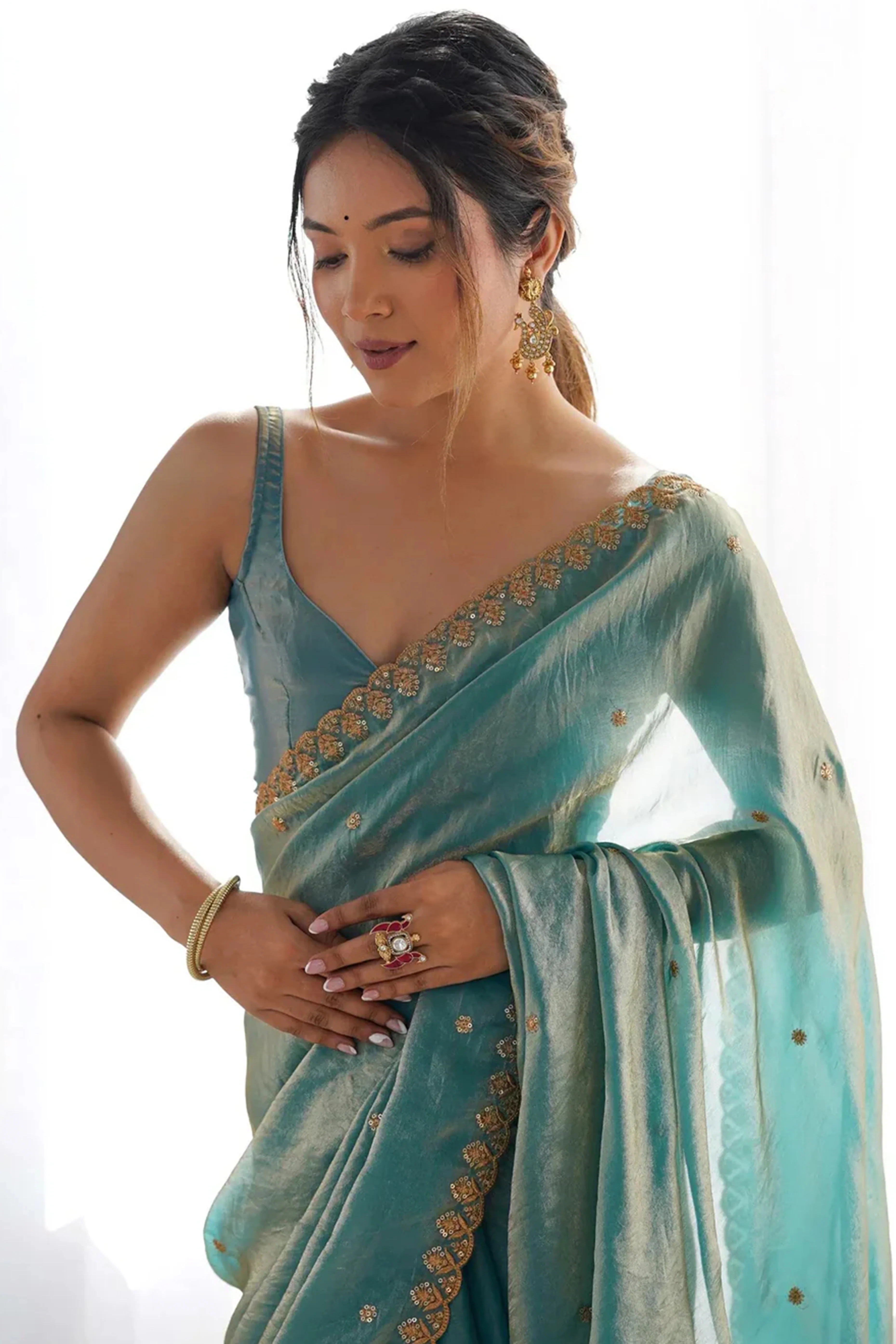 Stunning Turquoise Organza Satin Silk Saree Adorned With Floral Sequin Zari Embroidery Work - Image 4
