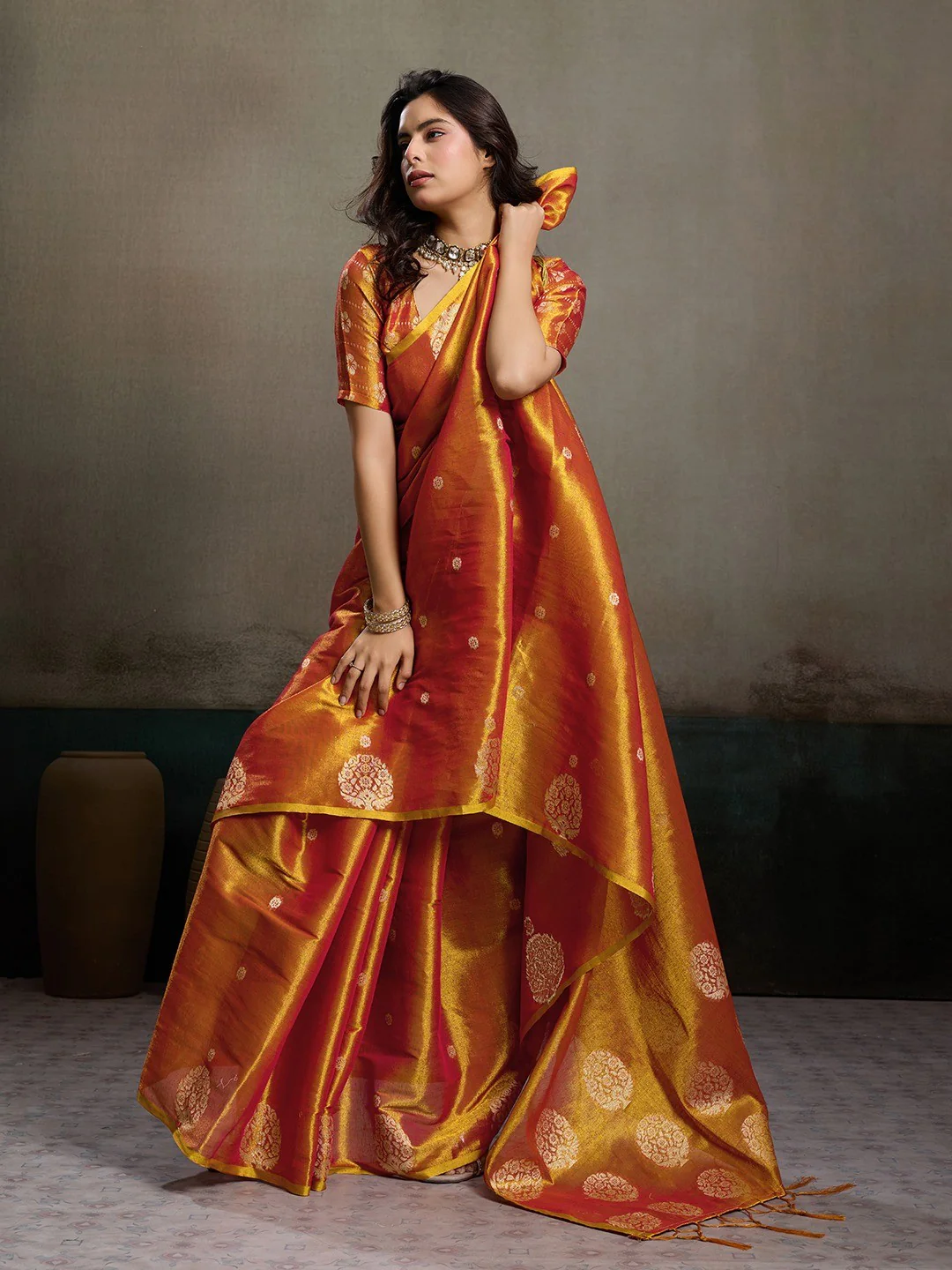 Stylish Orange Tissue Saree with Fine Woven Floral Patterns and Glossy Finish - Image 3