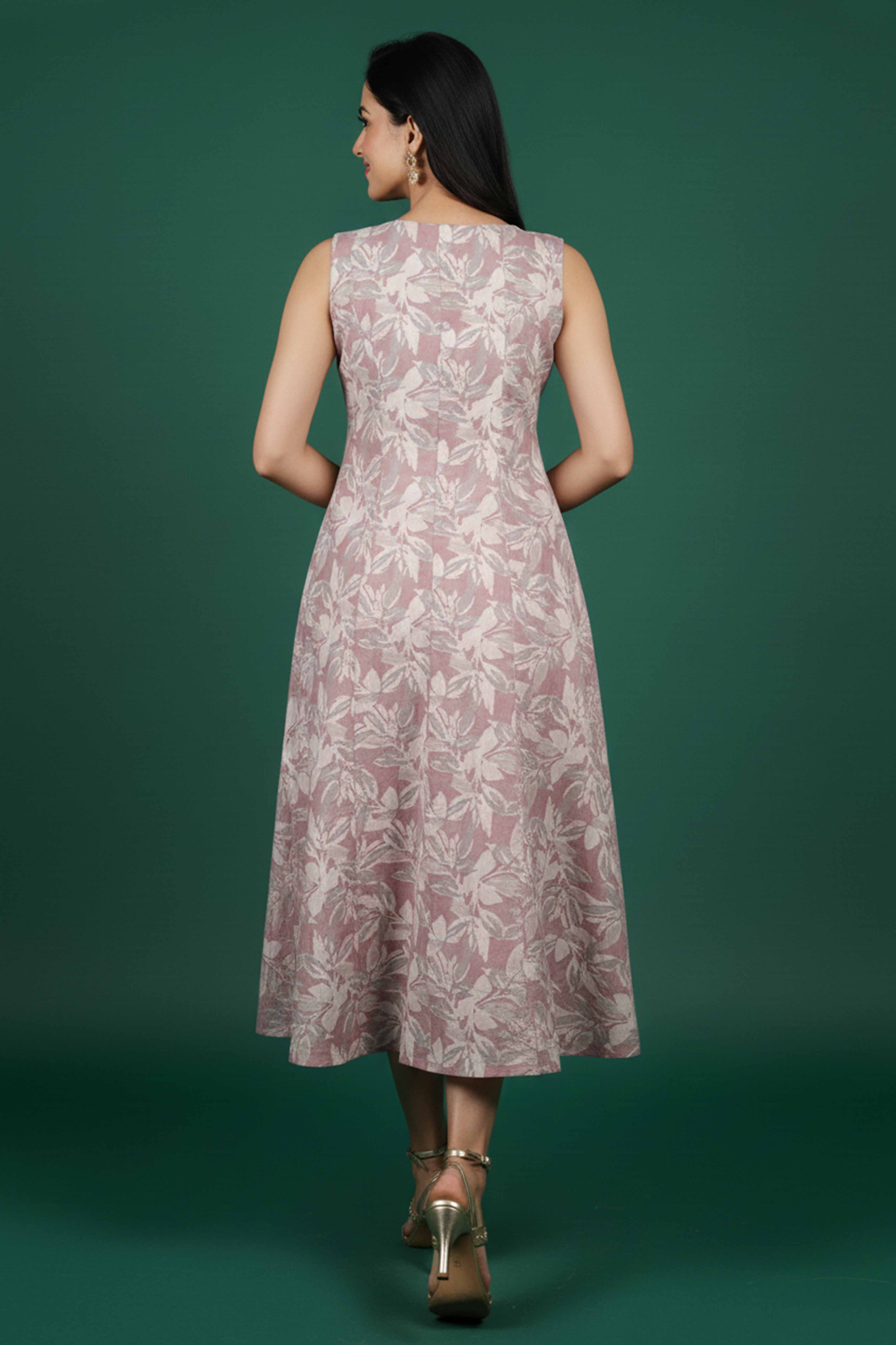 Stylish Peach Cotton Blend Dress Featuring Floral Prints & Sleeveless Cut With Pearl Button - Image 3