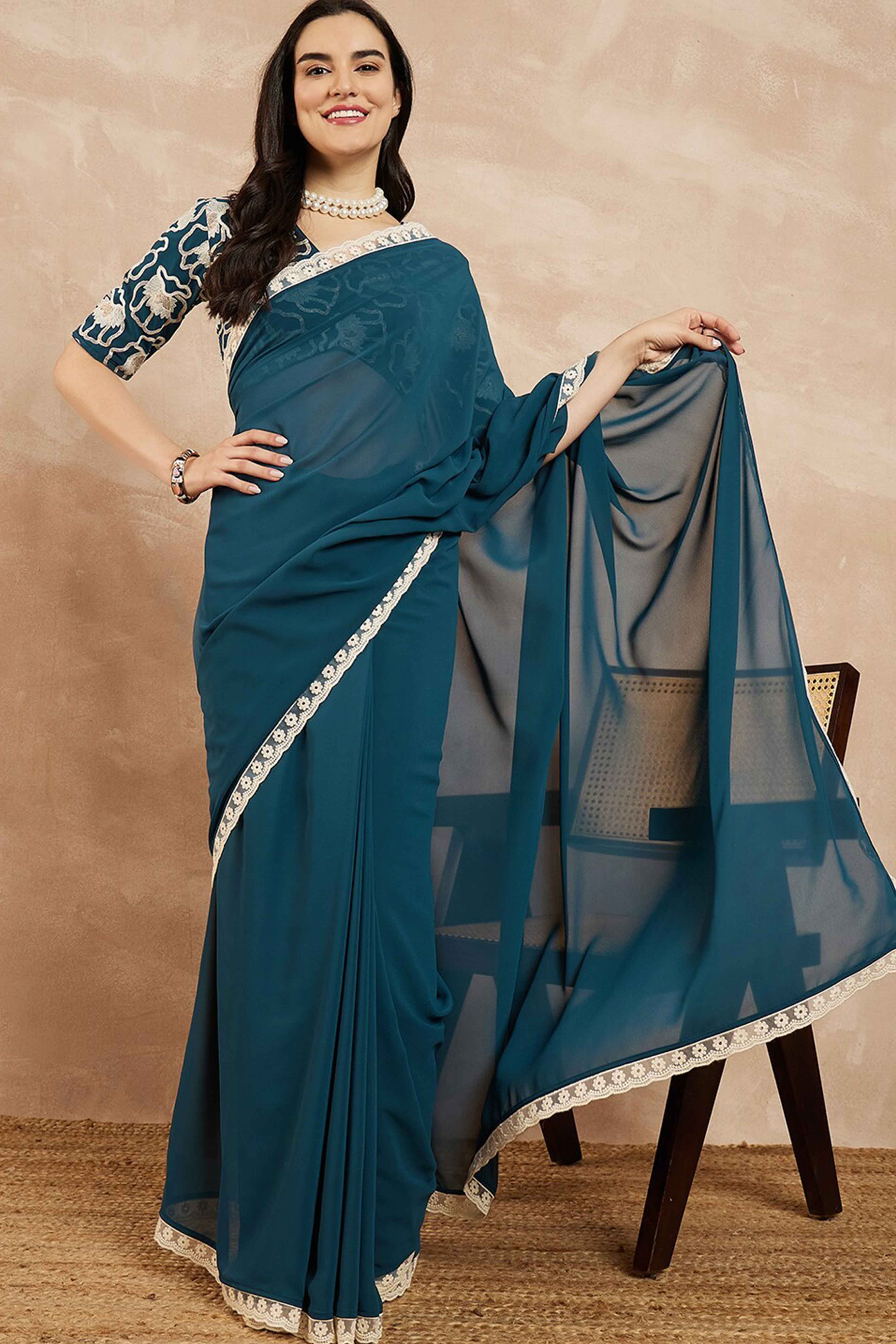 Teal Blue Solid Georgette Saree With Embroidered Border - Image 3