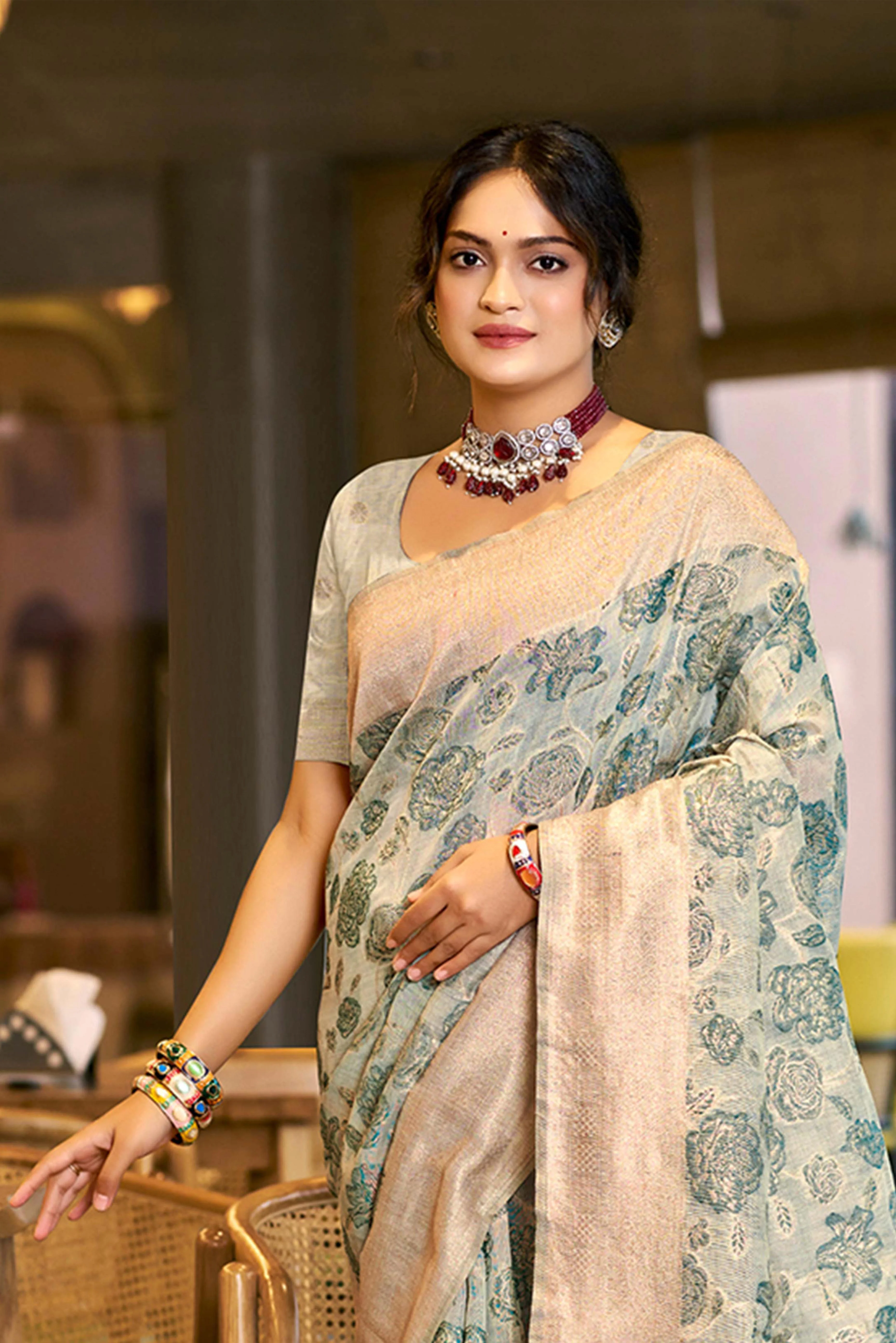 Teal Premium Cotton Silk Saree Highlighted With Floral Weaving Work & Tassel Pallu - Image 4